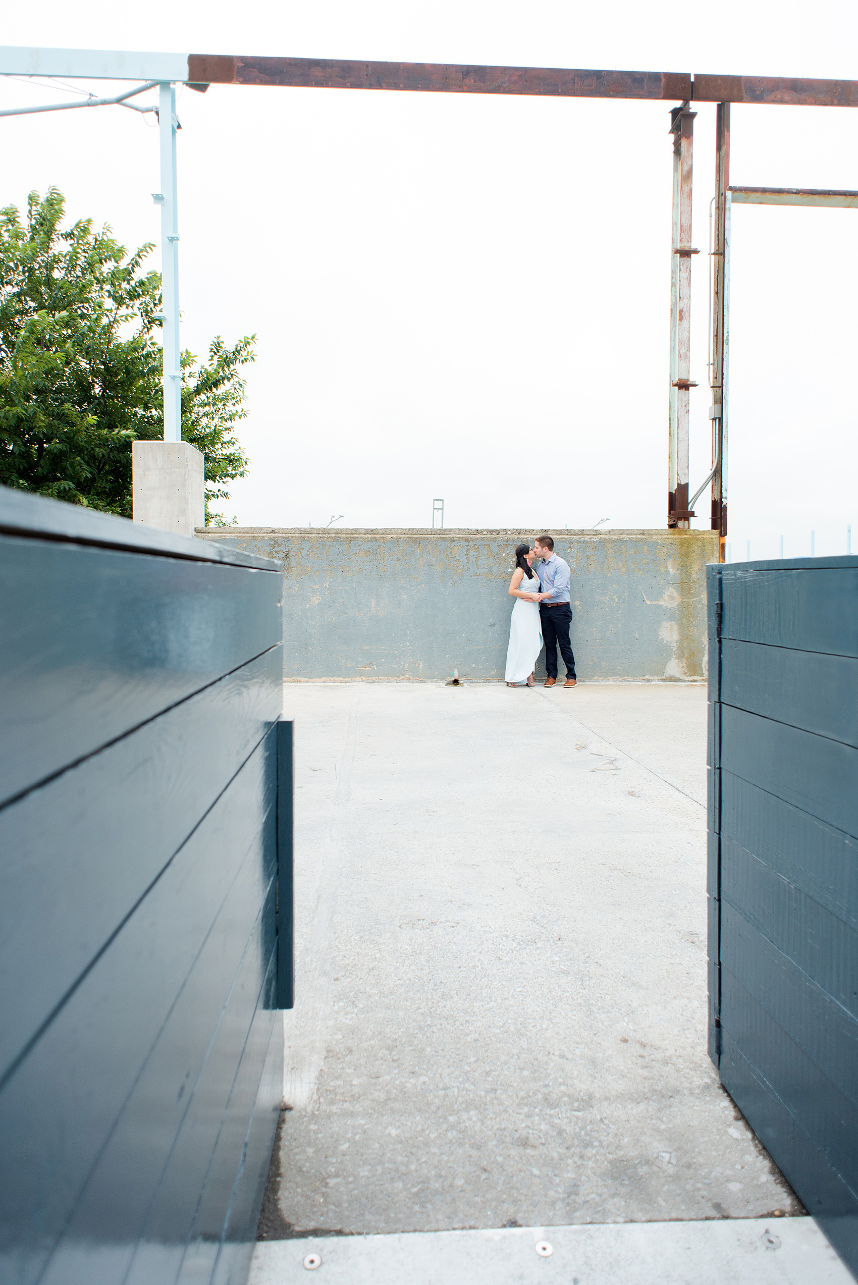 Brooklyn engagement photos by Mikkel Paige Photography. These beautiful, love-filled images in the park overlook bridges, the Manhattan skyline and waterfront on Piers 5 and 6. They'll provide inspiration from the bride and groom for outfits, romantic picture ideas and all around feel-good smiles! Click through to see their complete session post! #mikkelpaige #NYCweddingphotographer #NYCengagementsession #brooklynengagementphotos #engagementphotosinBrooklyn #BrooklynBridgePark #BrooklynPiers #ManhattanSkyline #BrooklynBridge #cityengagementphotos