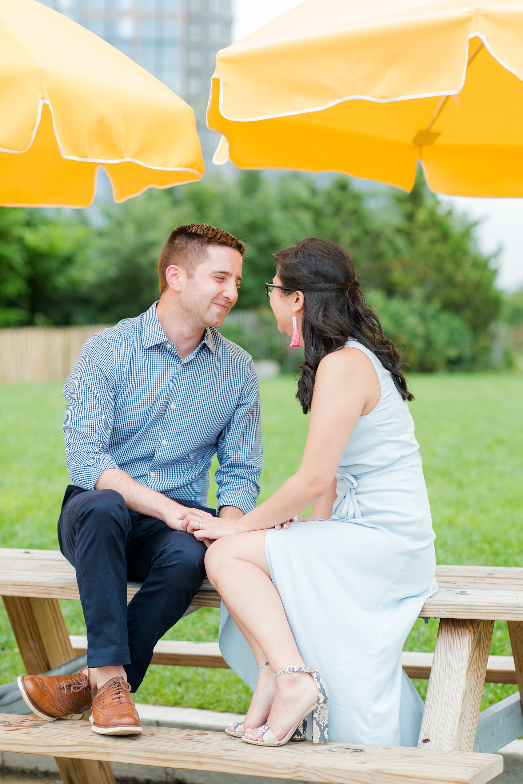 Brooklyn engagement photos by Mikkel Paige Photography. These beautiful, love-filled images in the park overlook bridges, the Manhattan skyline and waterfront on Piers 5 and 6. They'll provide inspiration from the bride and groom for outfits, romantic picture ideas and all around feel-good smiles! Click through to see their complete session post! #mikkelpaige #NYCweddingphotographer #NYCengagementsession #brooklynengagementphotos #engagementphotosinBrooklyn #BrooklynBridgePark #BrooklynPiers #ManhattanSkyline #BrooklynBridge #cityengagementphotos