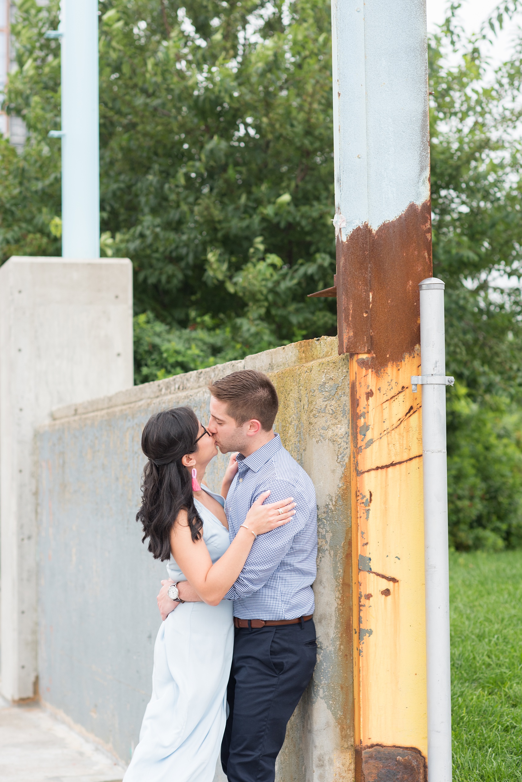 Brooklyn engagement photos by Mikkel Paige Photography. These beautiful, love-filled images in the park overlook bridges, the Manhattan skyline and waterfront on Piers 5 and 6. They'll provide inspiration from the bride and groom for outfits, romantic picture ideas and all around feel-good smiles! Click through to see their complete session post! #mikkelpaige #NYCweddingphotographer #NYCengagementsession #brooklynengagementphotos #engagementphotosinBrooklyn #BrooklynBridgePark #BrooklynPiers #ManhattanSkyline #BrooklynBridge #cityengagementphotos 