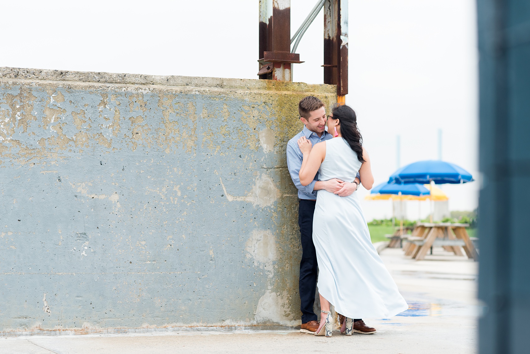 Brooklyn engagement photos by Mikkel Paige Photography. These beautiful, love-filled images in the park overlook bridges, the Manhattan skyline and waterfront on Piers 5 and 6. They'll provide inspiration from the bride and groom for outfits, romantic picture ideas and all around feel-good smiles! Click through to see their complete session post! #mikkelpaige #NYCweddingphotographer #NYCengagementsession #brooklynengagementphotos #engagementphotosinBrooklyn #BrooklynBridgePark #BrooklynPiers #ManhattanSkyline #BrooklynBridge #cityengagementphotos