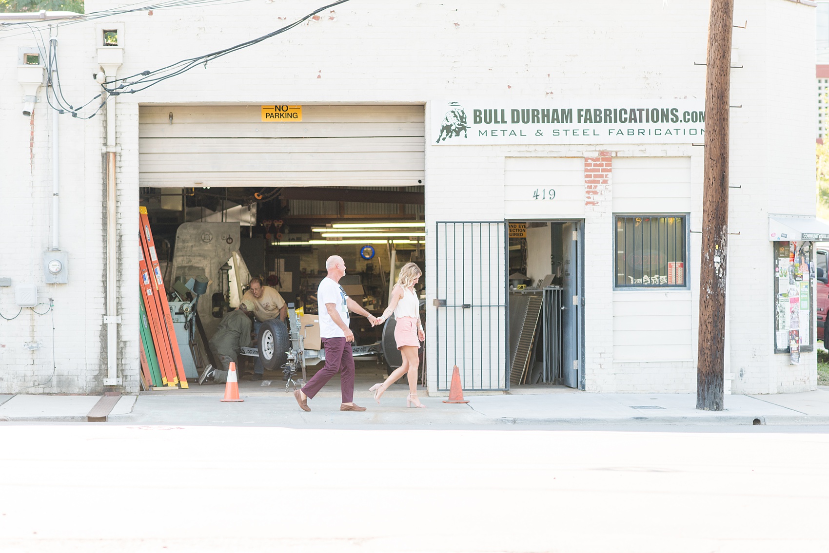 Urban engagement photos in downtown Durham, North Carolina, by Mikkel Paige Photography. #DurhamWeddingPhotographer #RaleighWeddingPhotographer #DurhamEngagementPhotos #urbanengagementphotos #cityengagementsession #cityengagementphotos