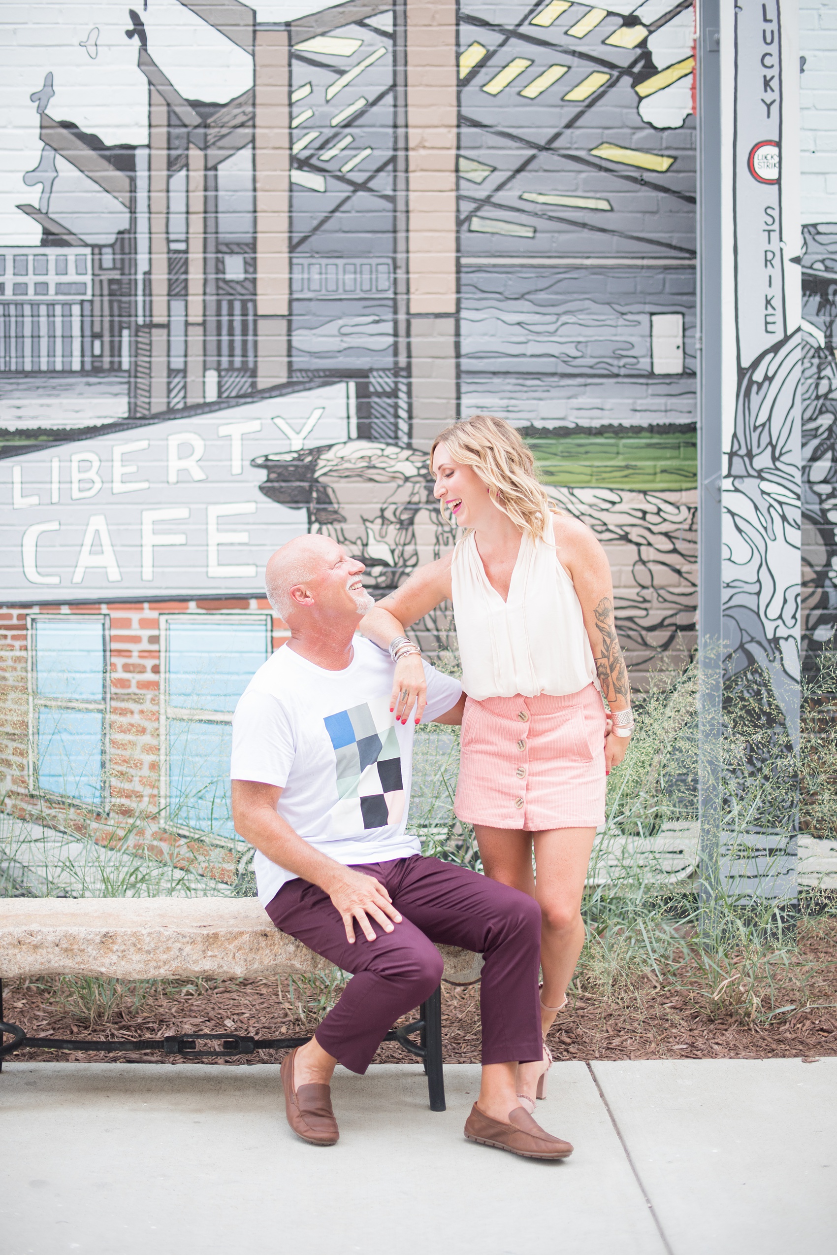 Urban engagement photos in downtown Durham, North Carolina, by Mikkel Paige Photography. #DurhamWeddingPhotographer #RaleighWeddingPhotographer #DurhamEngagementPhotos #urbanengagementphotos #cityengagementsession #cityengagementphotos