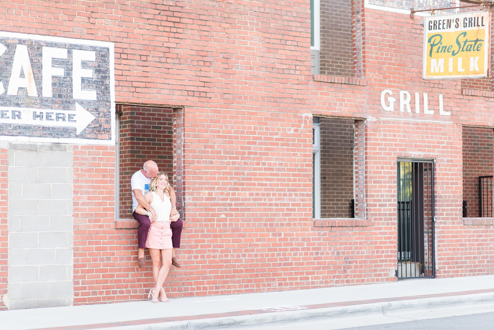 Urban engagement photos in downtown Durham, North Carolina, by Mikkel Paige Photography. #DurhamWeddingPhotographer #RaleighWeddingPhotographer #DurhamEngagementPhotos #urbanengagementphotos #cityengagementsession #cityengagementphotos