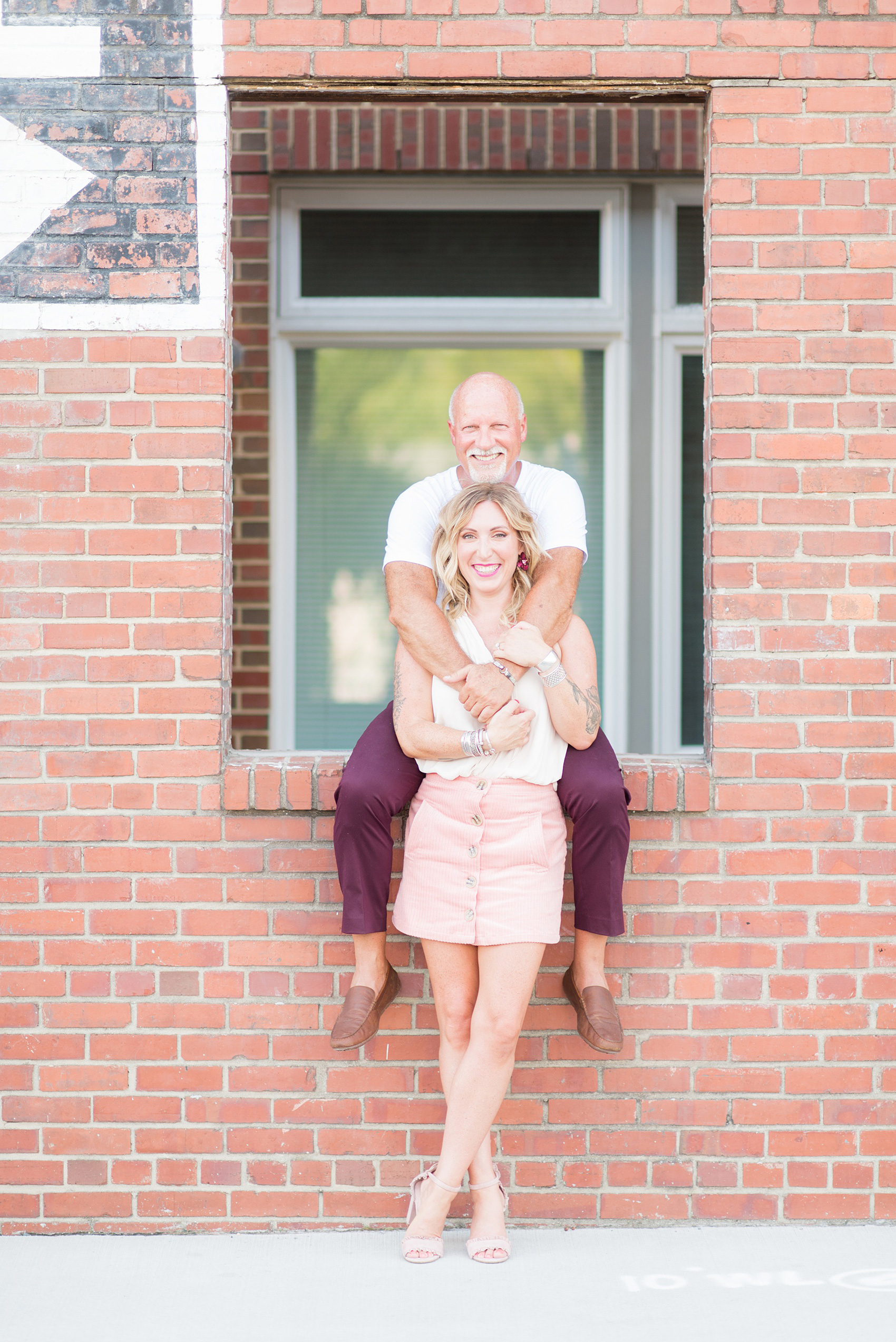 Urban engagement photos in downtown Durham, North Carolina, by Mikkel Paige Photography. #DurhamWeddingPhotographer #RaleighWeddingPhotographer #DurhamEngagementPhotos #urbanengagementphotos #cityengagementsession #cityengagementphotos