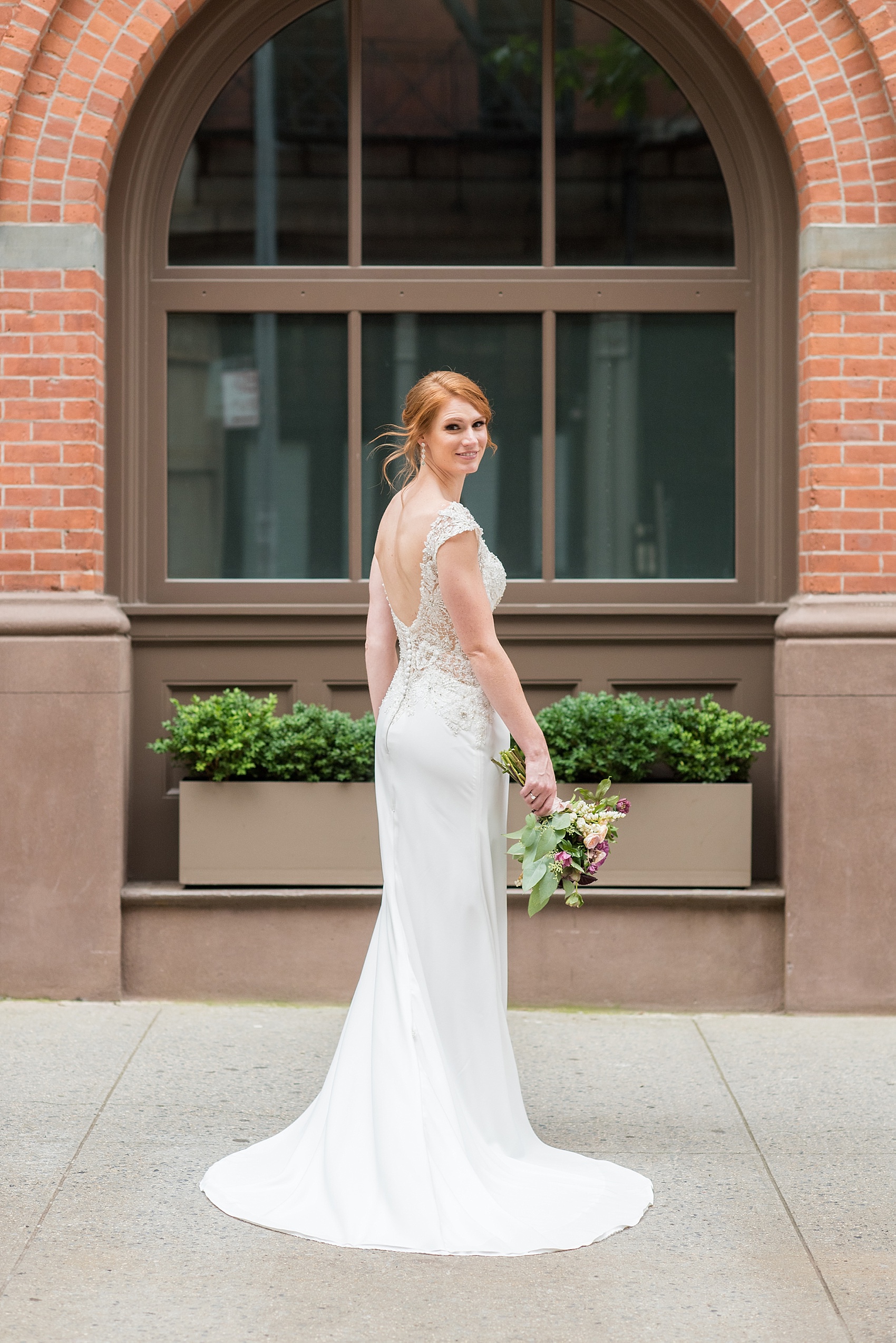 Wedding photos at Tribeca Rooftop by Mikkel Paige Photography, in NYC. This Manhattan venue has the perfect view of the New York City skyline including Freedom Tower! #ManhattanWedding #TribecaRooftop #TribecaRooftopWeddingPhotos #SeptemberWedding #RedHeadBride #BrideandGroom #MikkelPaige #WeddingPhotos #CandidMoments