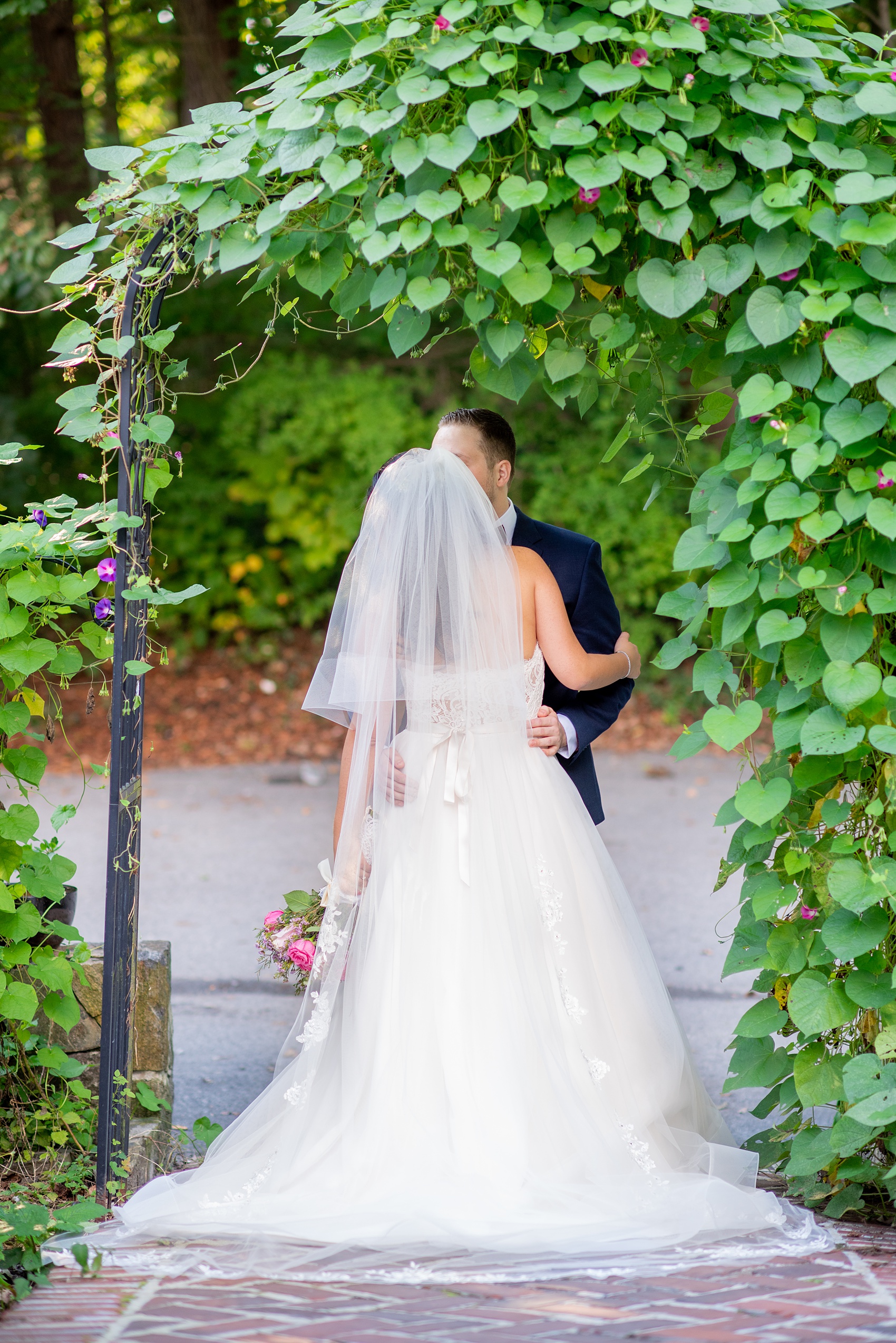 Fall wedding photos at Crabtree's Kittle House in Chappaqua, New York by Mikkel Paige Photography. This venue in Westchester county was the perfect place with a country vibe to capture the bride and groom photos. The bride had timeless style with her strapless lace and tulle dress and the groom wore a custom navy blue suit. Click through for more pictures and ideas from their day! #mikkelpaige #CrabtreesKittleHouse #WestchesterWeddingVenues #WestchesterWedding #SeptemberWedding #brideandgroom