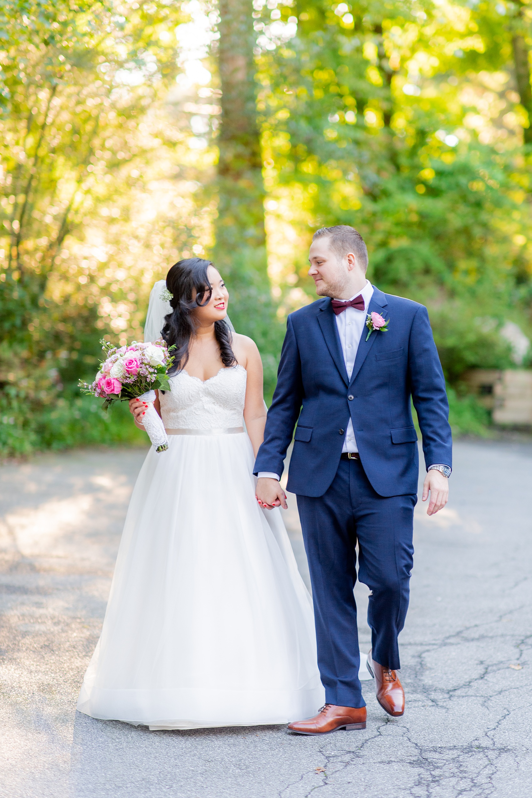 Fall wedding photos at Crabtree's Kittle House in Chappaqua, New York by Mikkel Paige Photography. This venue in Westchester county was the perfect place with a country vibe to capture the bride and groom photos. The bride had timeless style with her strapless lace and tulle dress and the groom wore a custom navy blue suit. Click through for more pictures and ideas from their day! #mikkelpaige #CrabtreesKittleHouse #WestchesterWeddingVenues #WestchesterWedding #SeptemberWedding #brideandgroom