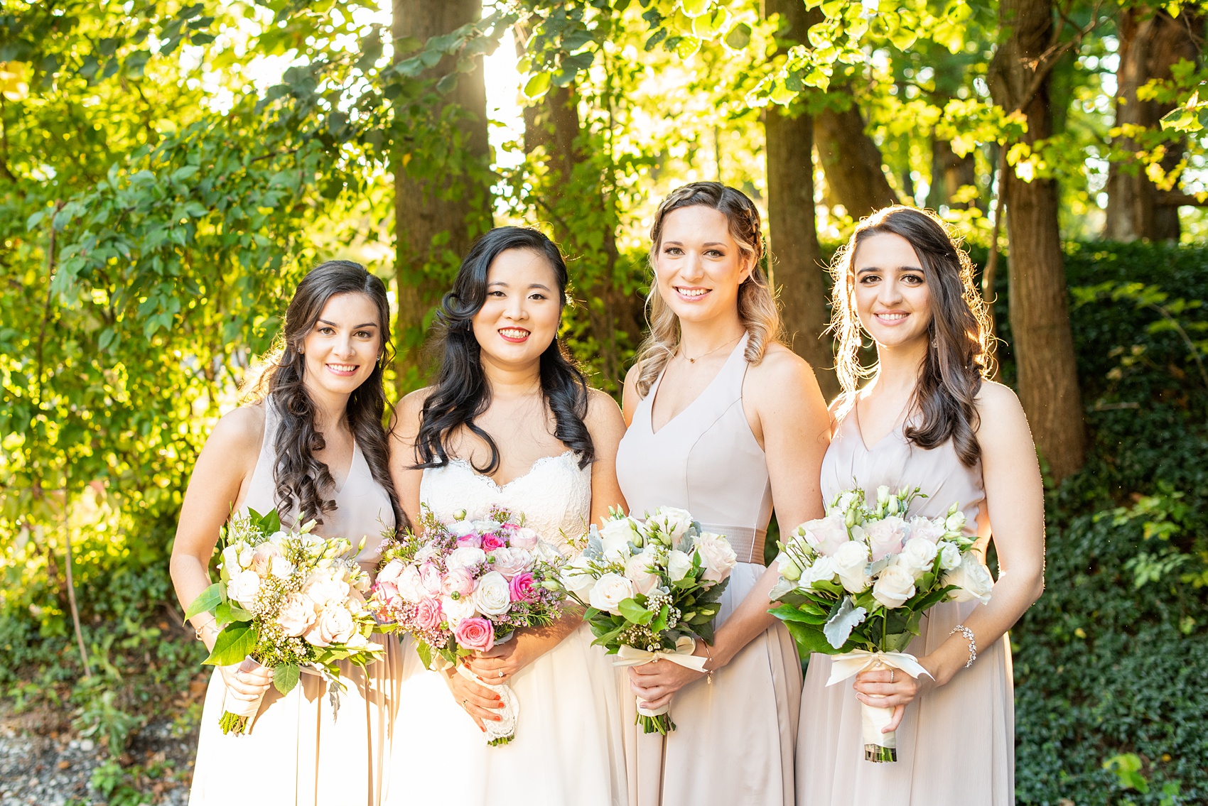 Wedding photos at Crabtree's Kittle House in Chappaqua, New York by Mikkel Paige Photography. This venue in Westchester county was the perfect place to capture their groomsmen photos in a country setting, with the bridesmaids in mis-matched dusty rose silk gowns carrying pink, white and peach rose and eucalyptus bouquets with Dusty Miller. The historic home is very close to NYC and perfect for a fall celebration. Click through for more wedding inspiration from their day! #bridesmaids #mikkelpaige #CrabtreesKittleHouse #WestchesterWeddingVenues #WestchesterWedding #SeptemberWedding #weddingparty #bride #dustryrose #fallwedding