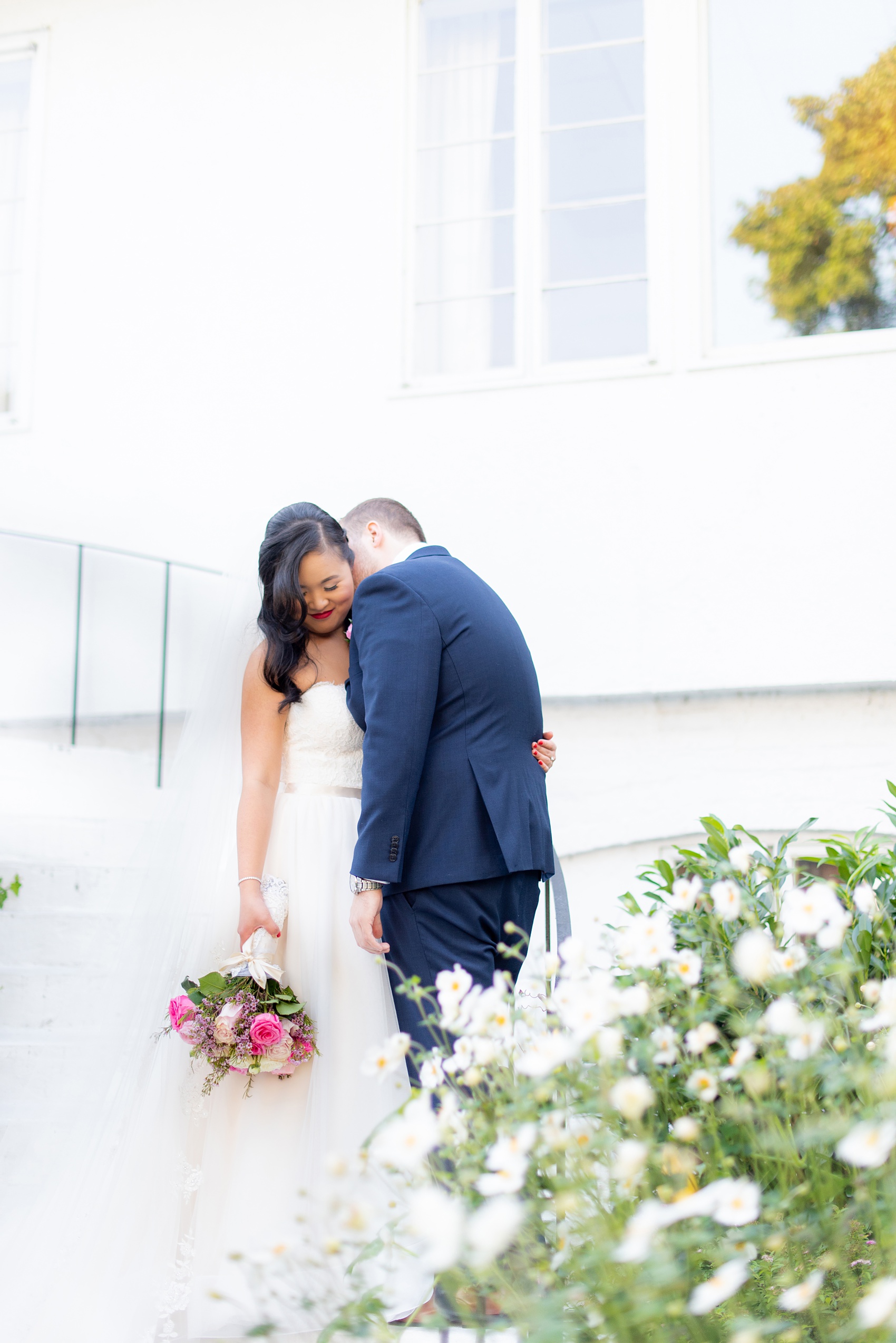 Fall wedding photos at Crabtree's Kittle House in Chappaqua, New York by Mikkel Paige Photography. This venue in Westchester county was the perfect place with a country vibe to capture the bride and groom photos. The bride had timeless style with her strapless lace and tulle dress and the groom wore a custom navy blue suit. Click through for more pictures and ideas from their day! #mikkelpaige #CrabtreesKittleHouse #WestchesterWeddingVenues #WestchesterWedding #SeptemberWedding #brideandgroom