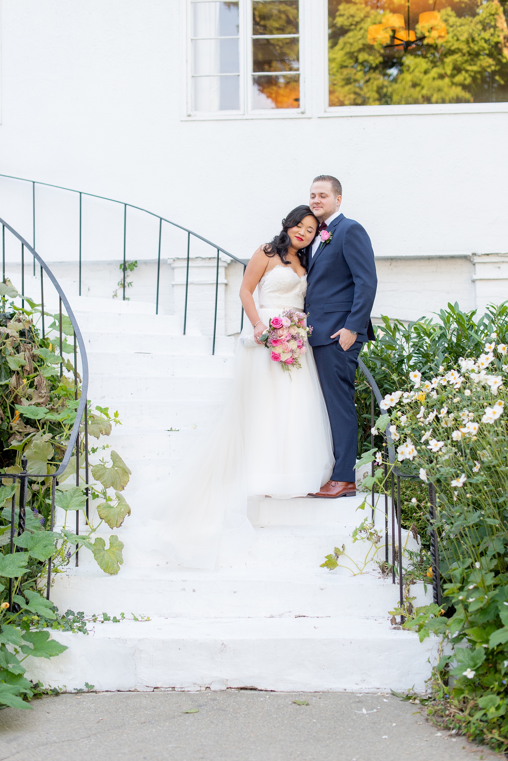 Fall wedding photos at Crabtree's Kittle House in Chappaqua, New York by Mikkel Paige Photography. This venue in Westchester county was the perfect place with a country vibe to capture the bride and groom photos. The bride had timeless style with her strapless lace and tulle dress and the groom wore a custom navy blue suit. Click through for more pictures and ideas from their day! #mikkelpaige #CrabtreesKittleHouse #WestchesterWeddingVenues #WestchesterWedding #SeptemberWedding #brideandgroom #NYwedding