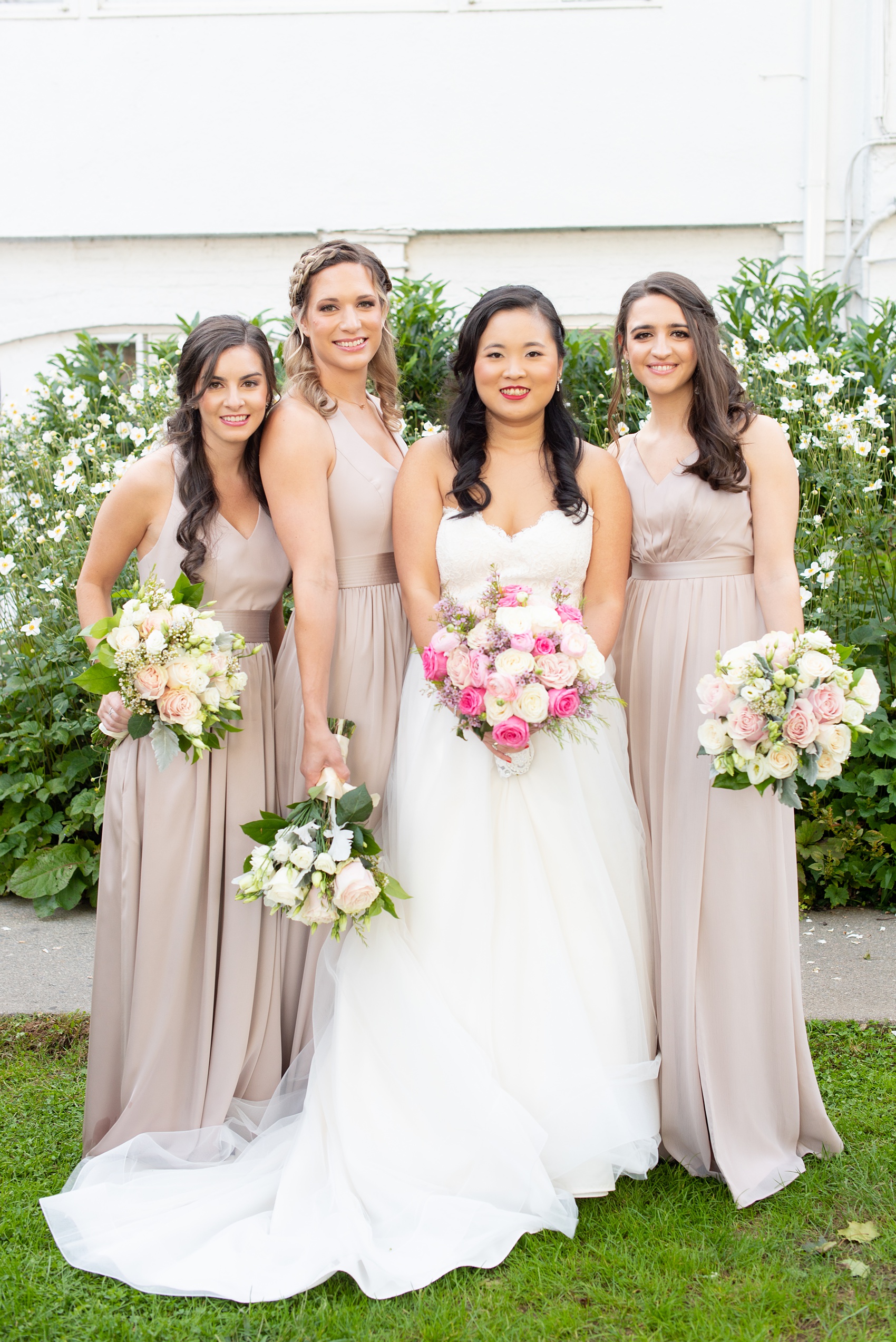 Wedding photos at Crabtree's Kittle House in Chappaqua, New York by Mikkel Paige Photography. This venue in Westchester county was the perfect place to capture their groomsmen photos in a country setting, with the bridesmaids in mis-matched dusty rose silk gowns carrying pink, white and peach rose and eucalyptus bouquets with Dusty Miller. The historic home is very close to NYC and perfect for a fall celebration. Click through for more wedding inspiration from their day! #bridesmaids #mikkelpaige #CrabtreesKittleHouse #WestchesterWeddingVenues #WestchesterWedding #SeptemberWedding #weddingparty #bride #dustryrose #fallwedding