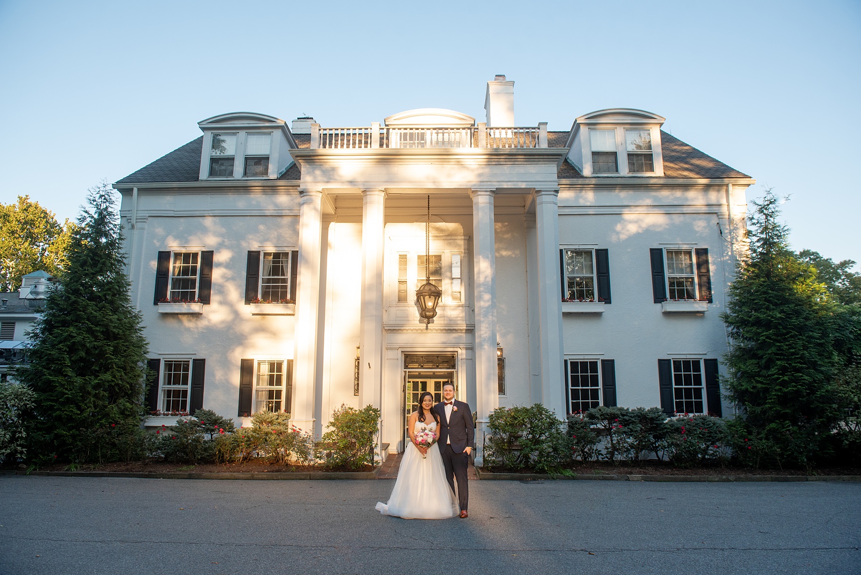 Fall wedding photos at Crabtree's Kittle House in Chappaqua, New York by Mikkel Paige Photography. This venue in Westchester county was the perfect place with a country vibe to capture the bride and groom photos. The bride had timeless style with her strapless lace and tulle dress and the groom wore a custom navy blue suit. Click through for more pictures and ideas from their day! #mikkelpaige #CrabtreesKittleHouse #WestchesterWeddingVenues #WestchesterWedding #SeptemberWedding #brideandgroom #NYwedding