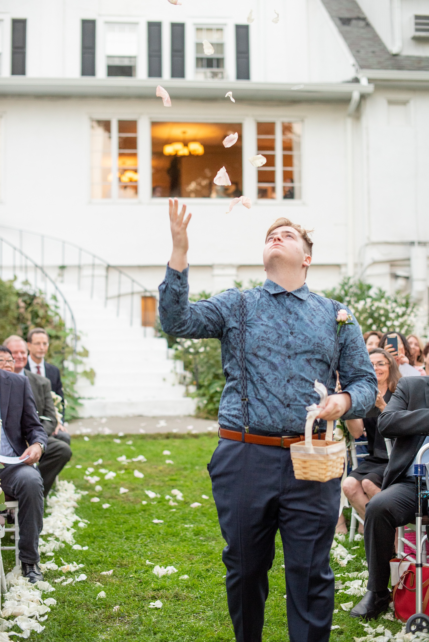 Wedding photos at Crabtree's Kittle House in Chappaqua, New York by Mikkel Paige Photography. This venue in Westchester county is a beautiful location for an outdoor September wedding. The couple’s ceremony overlooked an awesome fall landscape and custom chalkboard sign welcomed guests. Click through for more inspiration from their day! #mikkelpaige #CrabtreesKittleHouse #WestchesterWeddingVenues #WestchesterWedding #SeptemberWedding #weddingceremony #outdoorceremony #flowerguy #flowergirl #petaltoss