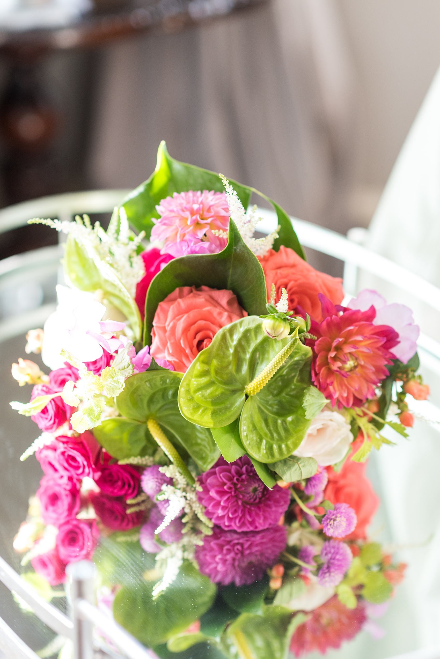 Highgrove Estate wedding photos in North Carolina by Mikkel Paige Photography. These pictures show a beautiful venue and detail images with tropical colorful flowers and bouquets by Flowers on Broad Street, near Raleigh. This couple had pink and green touches, planned by @asouthernsoiree. Click through for more details like this from their celebration! #NorthCarolinaVenues #WeddingVenues #MikkelPaige #ASouthernSoiree #tropicalflowers #weddingflowers #weddingbouquet #weddingdetails