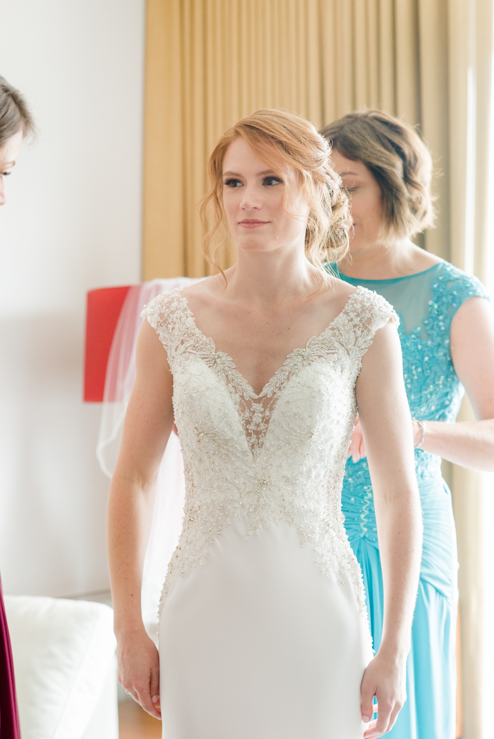 Photos of a NYC wedding venue, Tribeca Rooftop, by Mikkel Paige Photography. This ceremony and reception location has an outdoor space overlooking the Manhattan skyline. These pictures will provide inspiration in New York! The bride wore a lace illusion gown with beading, her hair up, and carried a bouquet of fall flowers. Click through for more details from this celebration! #TribecaRooftop #MikkelPaige #NYCwedding #NYCWeddingVenues #NYCWeddingPhotography #BridalGown #RKBridal