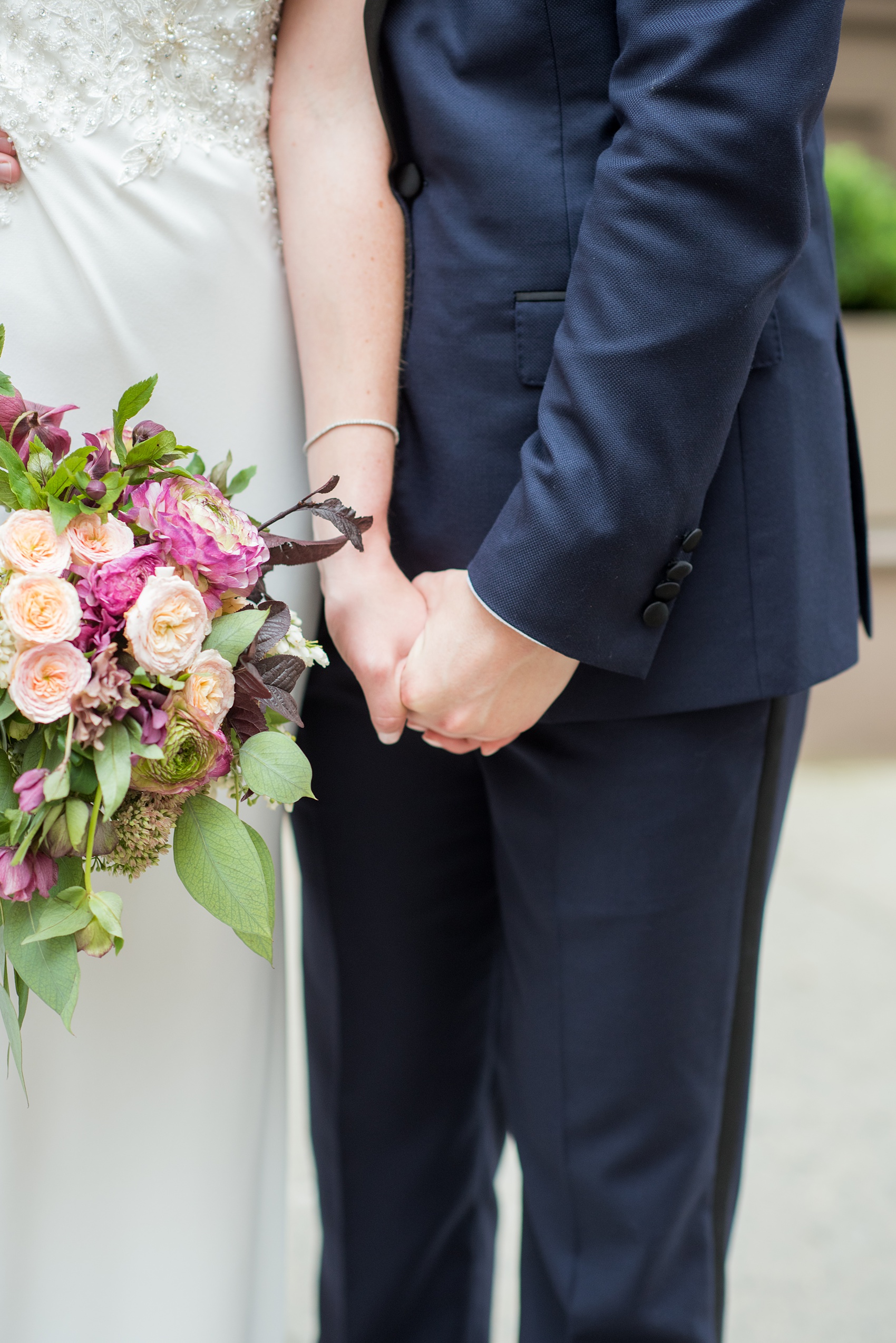 Photos of a NYC wedding venue, Tribeca Rooftop, by Mikkel Paige Photography. This ceremony and reception location has an outdoor space overlooking the Manhattan skyline. These pictures of the bride and groom will provide inspiration in New York! She wore a lace illusion gown with beading, her hair up, and carried a bouquet of fall flowers and he was in a navy suit. Click through for more details from this celebration! #TribecaRooftop #MikkelPaige #NYCwedding #NYCWeddingVenues #BrideandGroom 