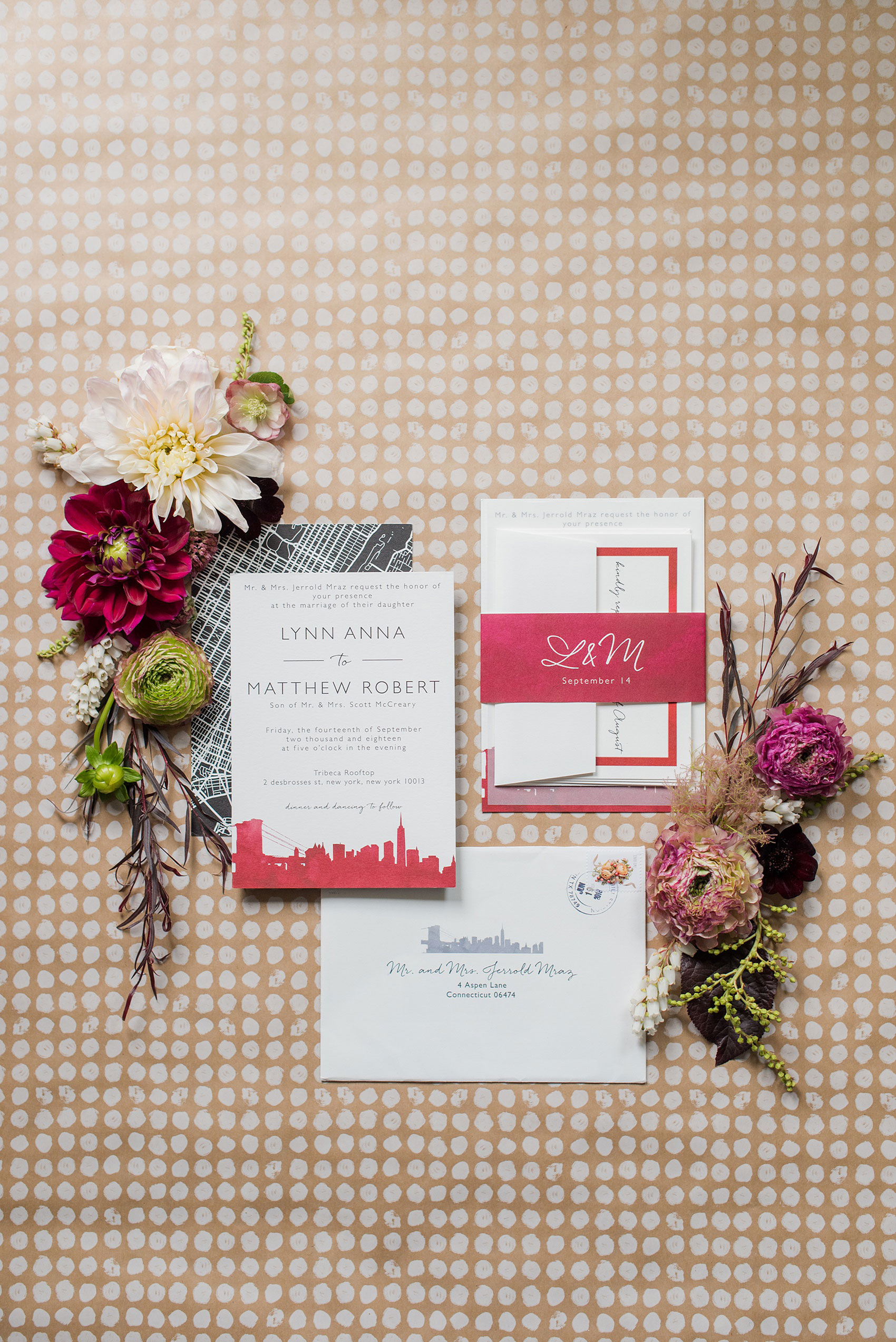 Photos of a NYC wedding venue, Tribeca Rooftop, by Mikkel Paige Photography. This ceremony and reception location has an outdoor space overlooking the Manhattan skyline. These pictures will provide inspiration in New York! Fall flowers were plentiful in bouquets and centerpieces, and the “skyline silhouette” theme was carried throughout their invitation and stationery. Click through for more details from this celebration! #TribecaRooftop #MikkelPaige #NYCwedding #NYCWeddingPhotography
