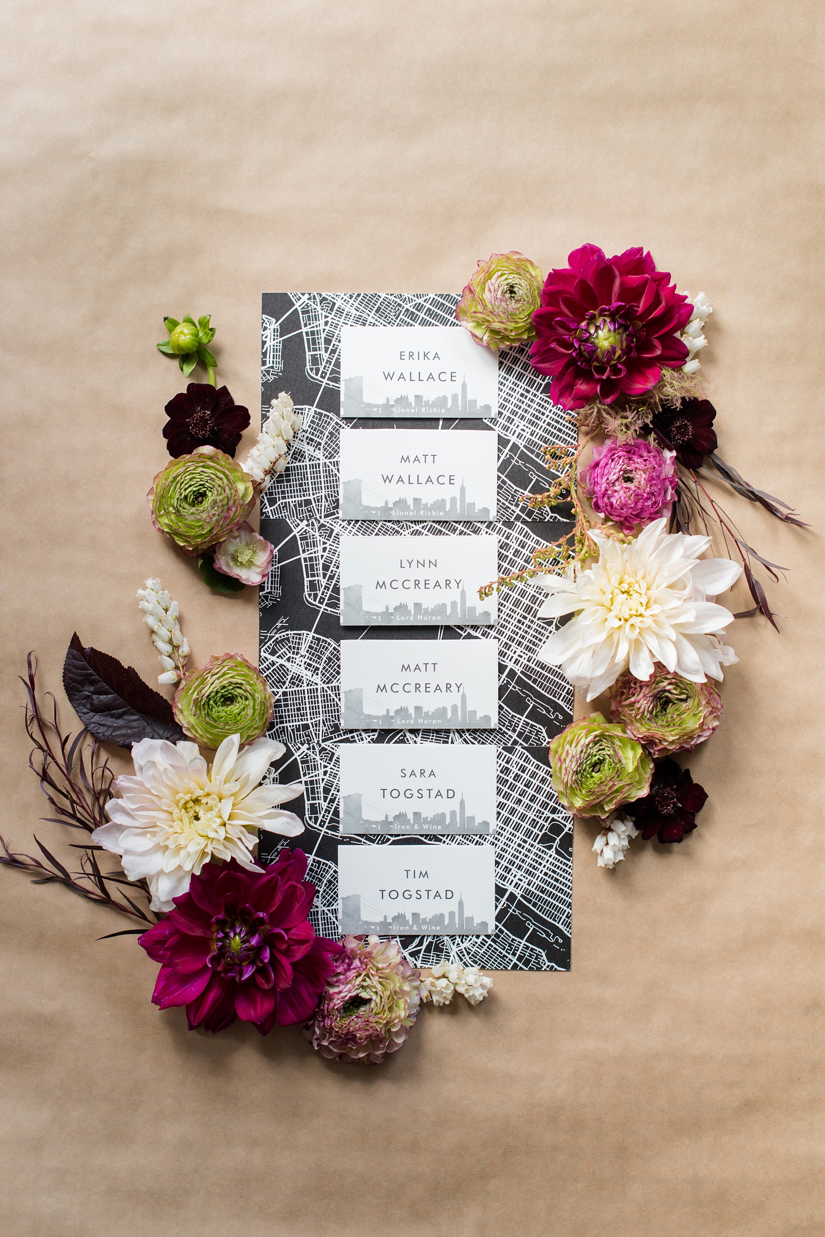 Photos of a NYC wedding venue, Tribeca Rooftop, by Mikkel Paige Photography. This ceremony and reception location has an outdoor space overlooking the Manhattan skyline. These pictures will provide inspiration in New York! Fall flowers were plentiful in bouquets and centerpieces, and the “skyline silhouette” theme was carried throughout their invitation and stationery. Click through for more details from this celebration! #TribecaRooftop #MikkelPaige #NYCwedding #NYCWeddingPhotography