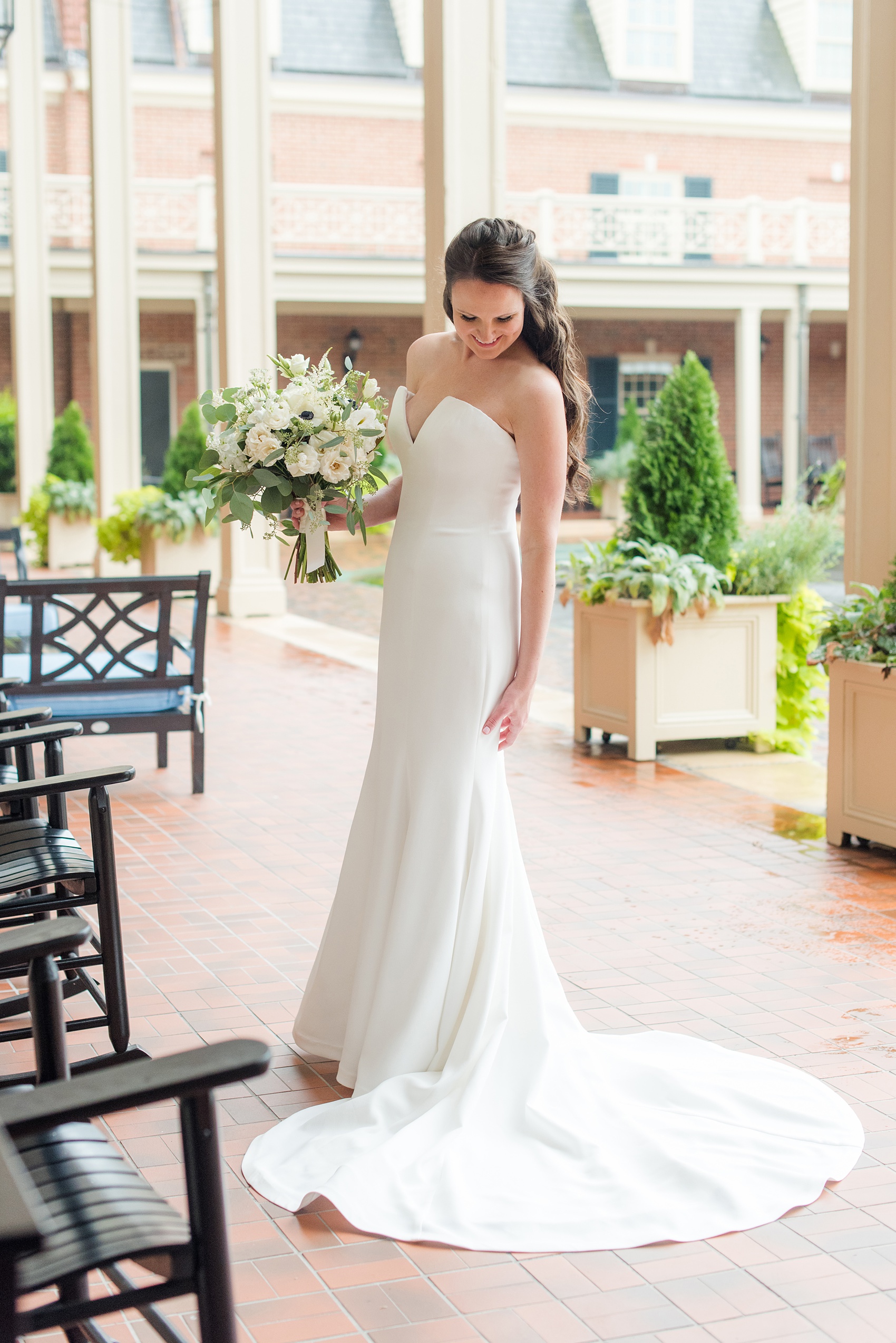 Photos of a fall wedding at The Carolina Inn, in Chapel Hill North Carolina, by Mikkel Paige Photography. This event venue doubles as a hotel for guests, who can enjoy a reception and ceremony indoors or outdoors. The bride wore a beautiful, simple white gown with a v-neck cut out and a cathedral length veil. Click through to see inspiration from the entire wedding! Planner: @asouthernsoiree #thecarolinainn #ChapelHillWeddings #MikkelPaige #ASouthernSoiree #bride #bridestyle #simpleweddinggown