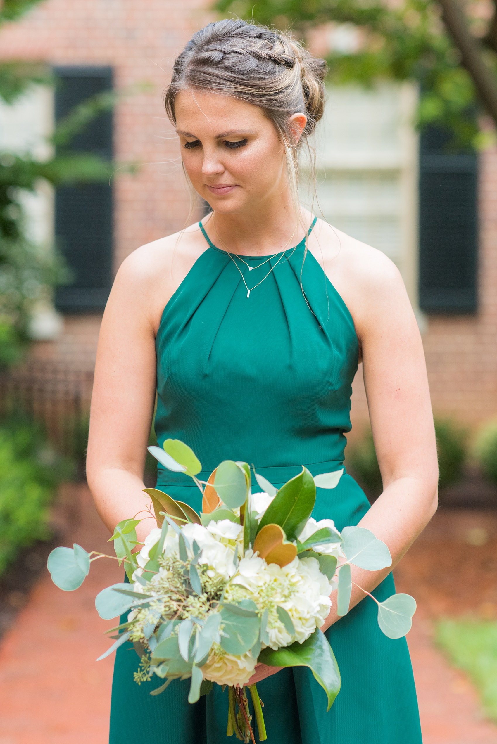 Wedding Party Photos of a fall wedding at The Carolina Inn, in Chapel Hill North Carolina, by Mikkel Paige Photography. This event venue doubles as a hotel for guests, who can enjoy a reception indoors or outdoors. The bridesmaids wore long green gowns and carried white bouquets with eucalyptus greenery. Click through to see inspiration from the entire wedding! Planner: @asouthernsoiree, Flowers by The Flower Cupboard #thecarolinainn #ChapelHillWeddings #MikkelPaige #ASouthernSoiree #greenbridesmaids #greenwedding #bridalparty