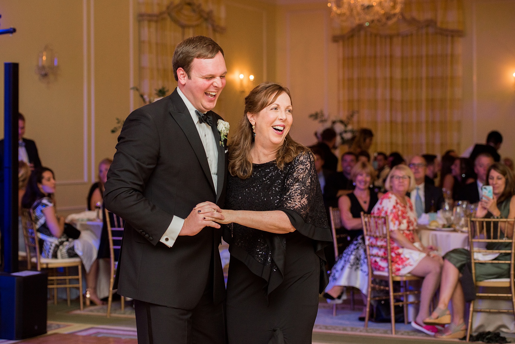 Photos of a fall wedding at The Carolina Inn, in Chapel Hill North Carolina, by Mikkel Paige Photography. This event venue doubles as a hotel for guests, with a for an indoor reception space. The bride and groom danced their first dance, listened to toasts and speeches and cut their cake in a beautiful ballroom. Click through to see all of this wedding inspiration! Planning by @asouthernsoiree #thecarolinainn #ChapelHillWeddings #MikkelPaige #ballroom #motherofthegroom