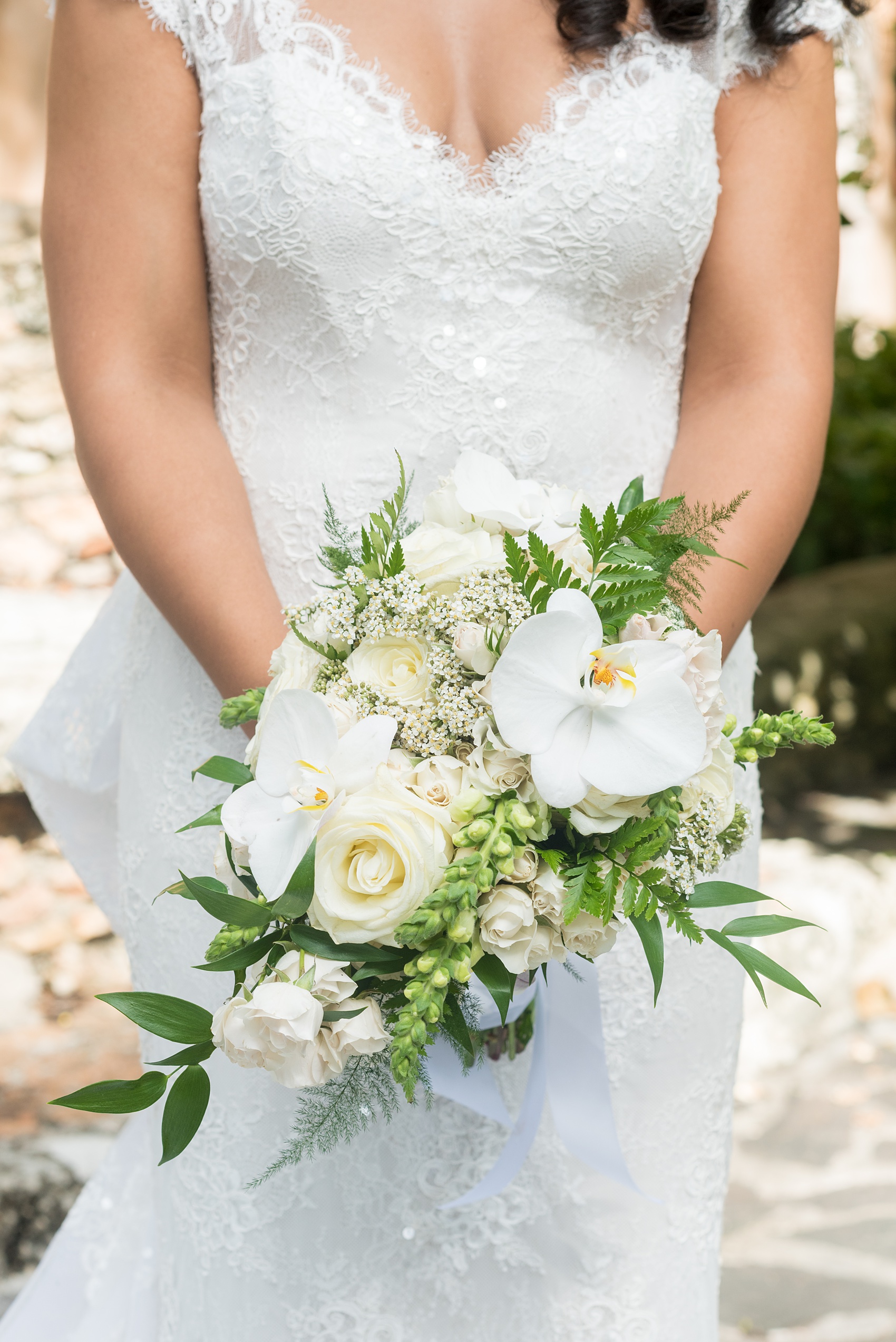 If you’re planning a destination wedding Casa de Campo in the Dominican Republic is a great location. It’s in La Romana, an hour from Punta Cana, and is an all inclusive resort with tropical Minitas beach and mountains view. It’s a beautiful venue, which these pictures by Mikkel Paige Photography prove. Click through for more flower ideas, including an all white bouquet and orchid boutonniere! Coordination by @theeventeur #mikkelpaige #weddingflowers #navybluewedding