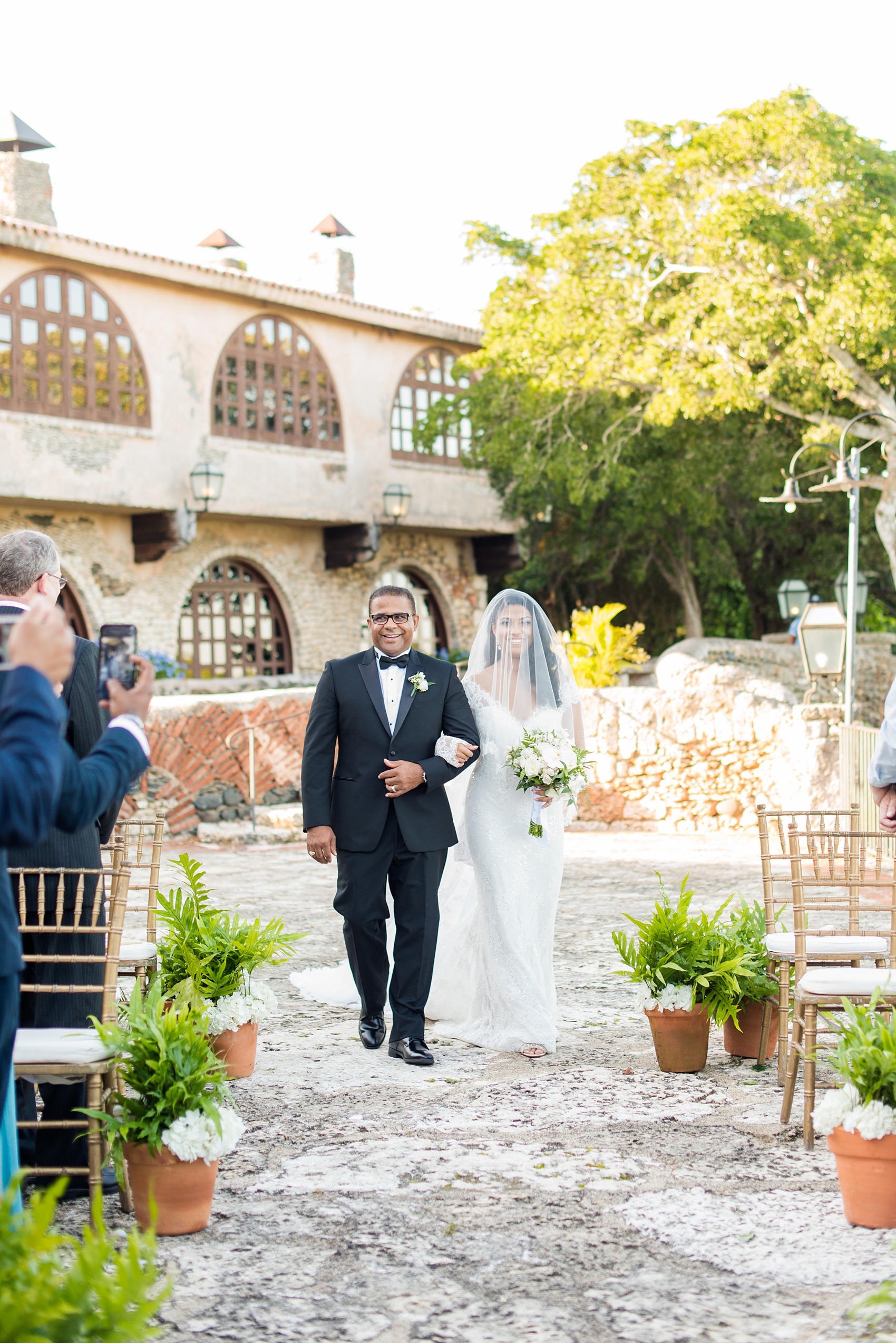 La Romana is an hour from Punta Cana and home to an incredible, all inclusive resort with beautiful Minitas beach and mountain view in the Dominican Republic. It’s a great location for a destination wedding, which these pictures of the outdoor ceremony, by Mikkel Paige Photography, prove. Click through for more Casa de Campo wedding photography and ideas! Planning by @theeventeur. #GettingReady #destinationwedding #mikkelpaige #outdoorceremony