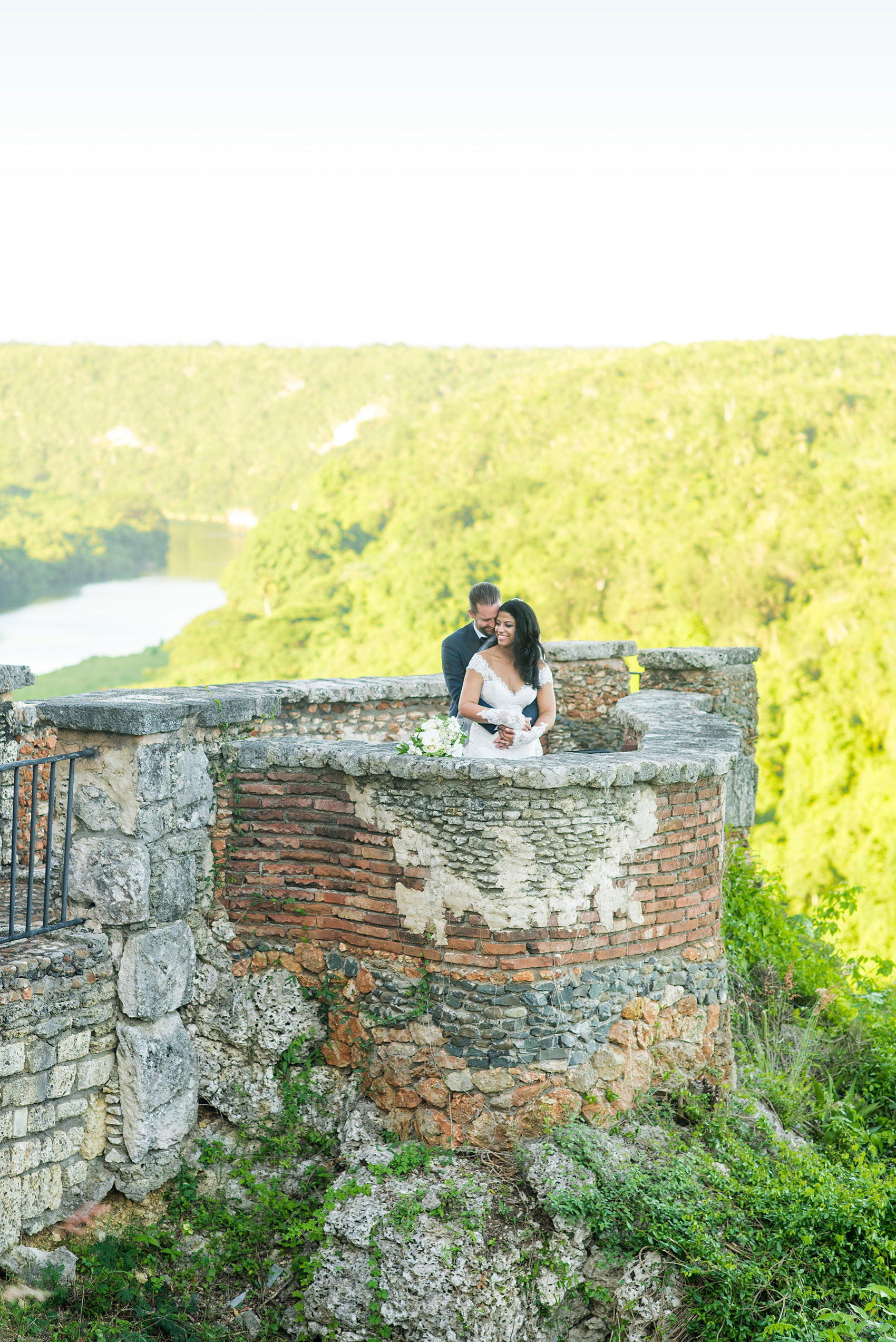 Planning a destination wedding? La Romana is 1 hour from Punta Cana and home to an incredible, all inclusive resort with a beautiful beach and mountains view in the Dominican Republic. It’s a great location, which these pictures of the bride and groom by Mikkel Paige Photography prove again and again! It also doubles as a vacation and honeymoon spot. Click through for more Casa de Campo wedding photography and ideas! Coordination by @theeventeur #mikkelpaige #brideandgroom #destinationwedding