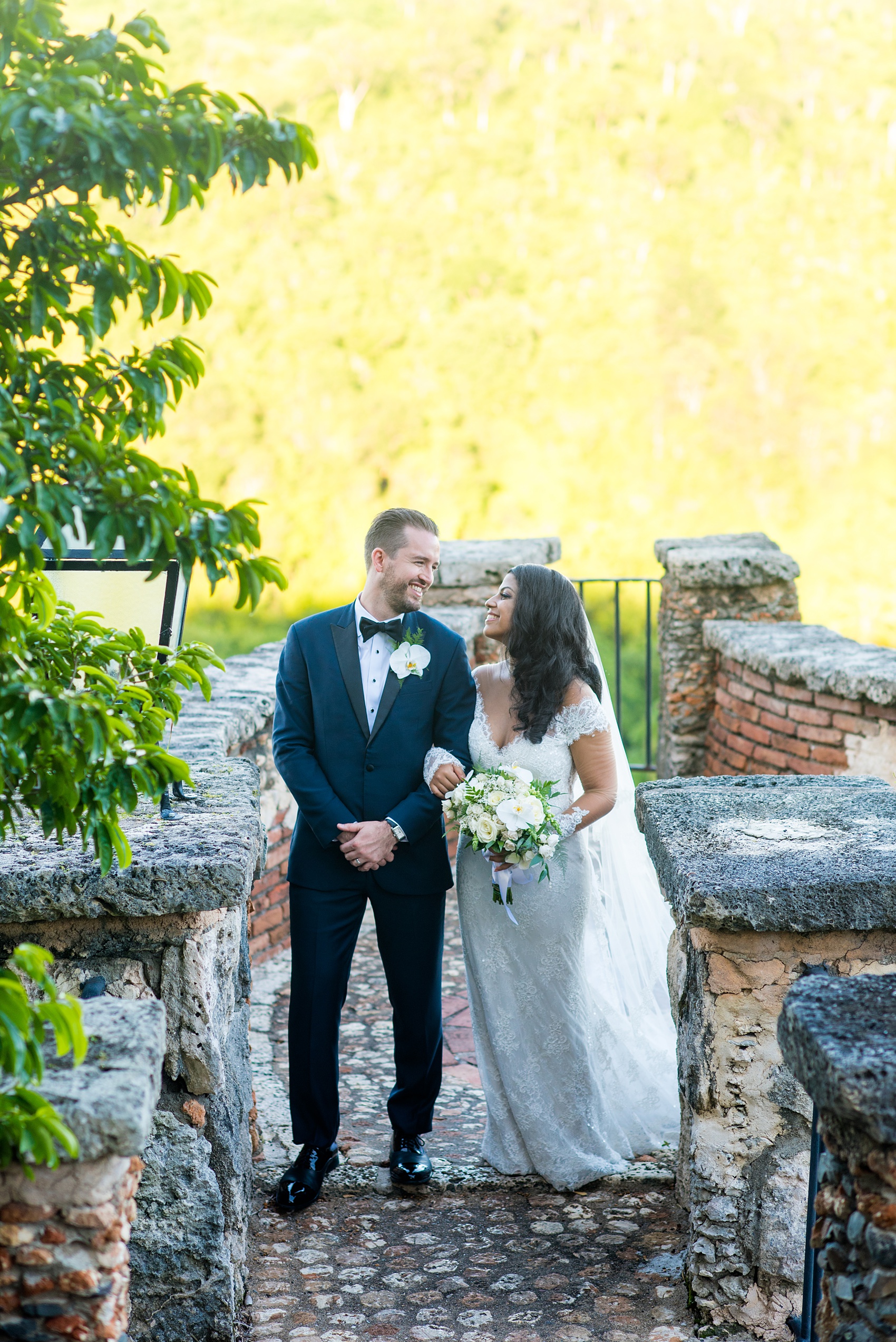 Planning a destination wedding? La Romana is 1 hour from Punta Cana and home to an incredible, all inclusive resort with a beautiful beach and mountains view in the Dominican Republic. It’s a great location, which these pictures of the bride and groom by Mikkel Paige Photography prove again and again! It also doubles as a vacation and honeymoon spot. Click through for more Casa de Campo wedding photography and ideas! Coordination by @theeventeur #mikkelpaige #brideandgroom #destinationwedding