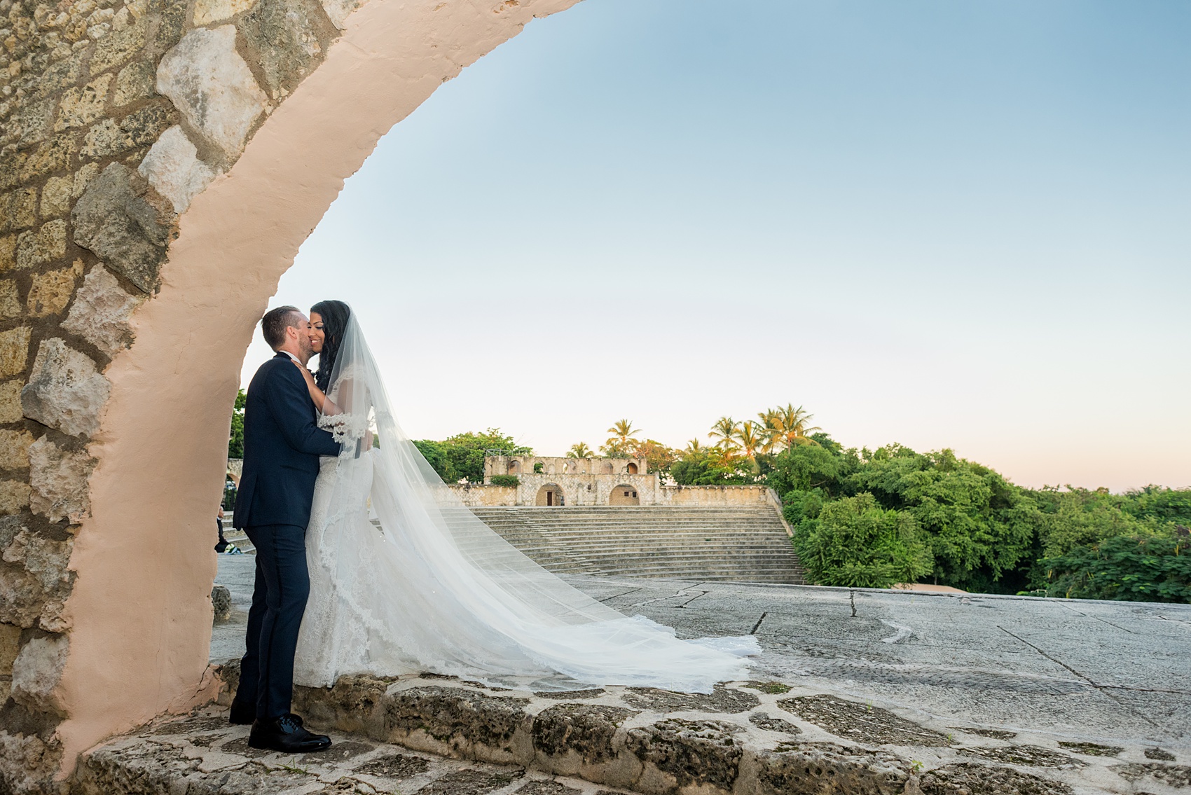 Planning a destination wedding? La Romana is 1 hour from Punta Cana and home to an incredible, all inclusive resort with a beautiful beach and mountains view in the Dominican Republic. It’s a great location, which these pictures of the bride and groom by Mikkel Paige Photography prove again and again! It also doubles as a vacation and honeymoon spot. Click through for more Casa de Campo wedding photography and ideas! Coordination by @theeventeur #mikkelpaige #brideandgroom #destinationwedding