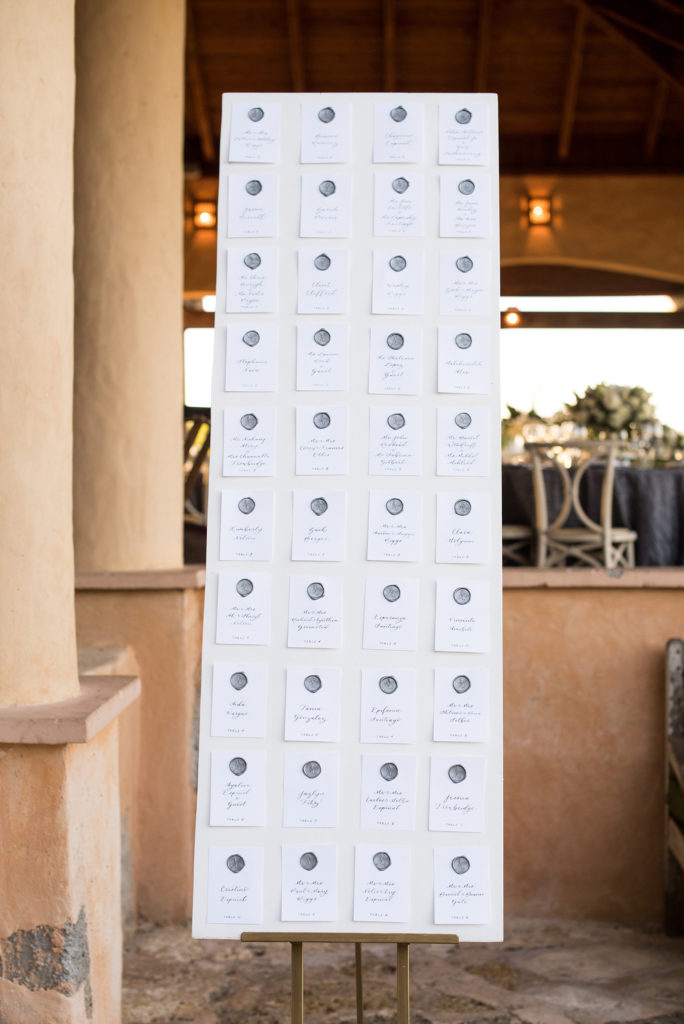 Casa de Campo in the Dominican Republic is a great location for a destination wedding. It’s in La Romana, an hour from Punta Cana, and is an all inclusive resort with Minitas beach and mountains view. It’s a beautiful venue, evidenced by these pictures by Mikkel Paige Photography. Click through for detail ideas like this custom calligraphy escort card display with wax seals! Planning by @theeventeur, cards by @agianetti of Write Pretty for Me. #mikkelpaige #escortcards #customcalligraphy