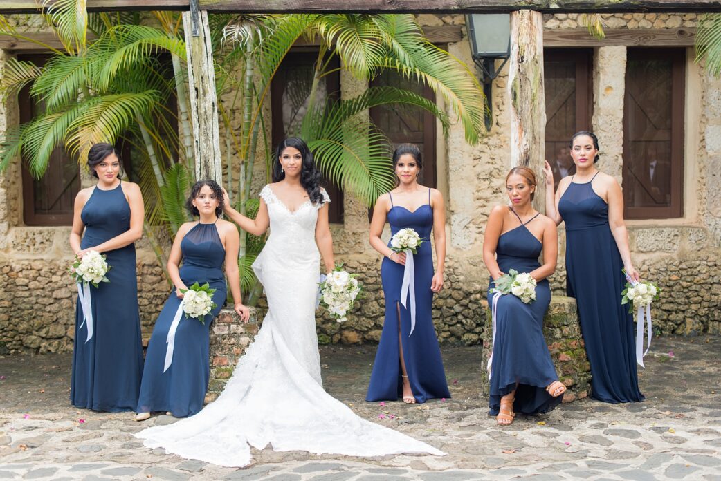 Mikkel Paige Photography, destination wedding photographer, pictures from Casa de Campo. This incredible venue in the Caribbean is in La Romana, Dominican Republic. It has such character and awesome, beautiful locations for photography at every turn. This photo of the bridesmaids in navy gowns was very Vogue-like and its creativity will give you great ideas for your day. Click through for more! #DestinationWedding #DestinationWeddingPhotographer #MikkelPaige #DominicanRepublicWedding