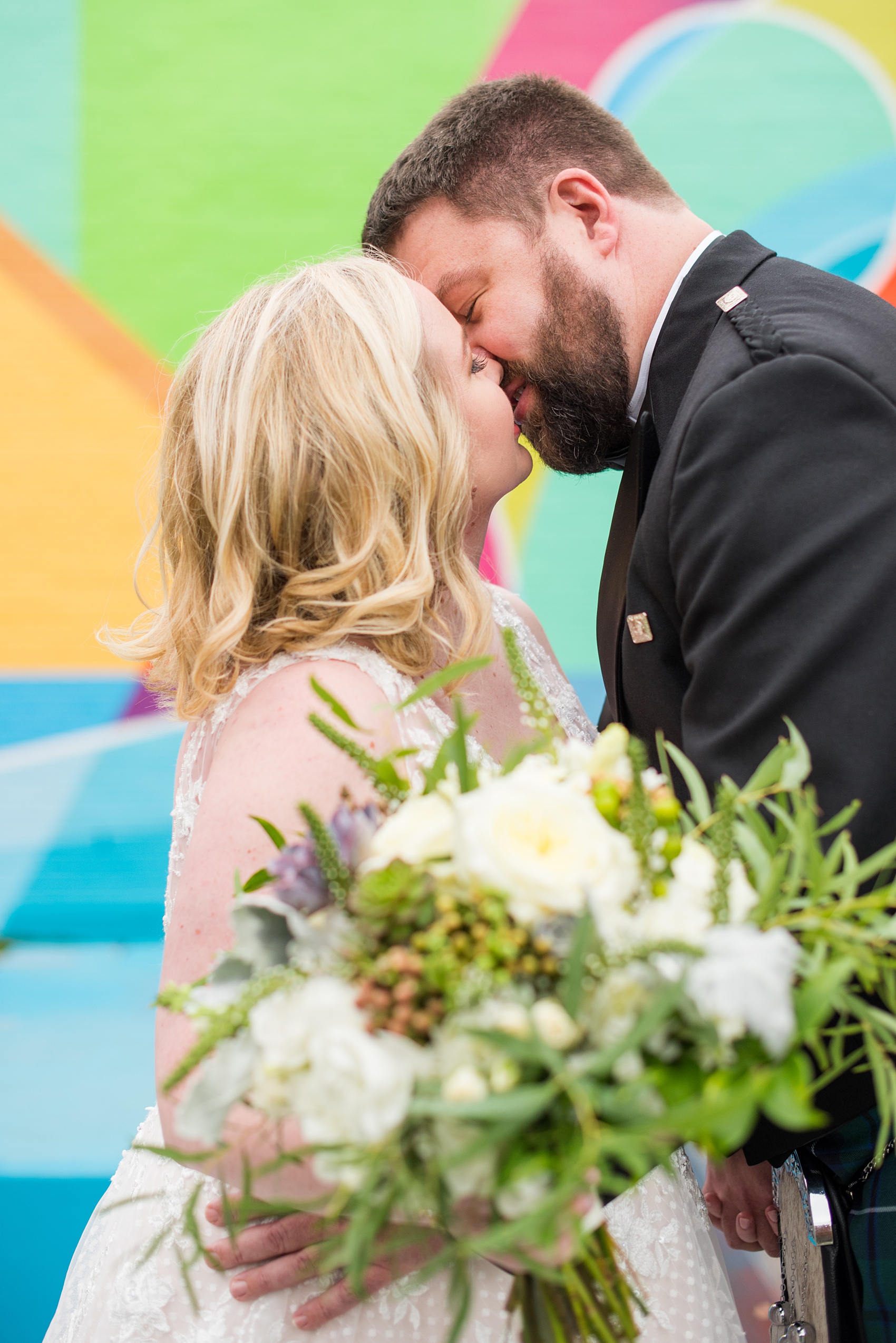 Mikkel Paige Photography captures a beautiful bride + groom during their fall wedding in Downtown Raleigh, North Carolina. All Saints Chapel was their ceremony + reception venue, which they decorated with gold + silver decor and autumn centerpieces. Couple portraits were taken outdoors and the fun event continued inside the unique, historic venue. Click through for all the details from this amazing celebration! #MikkelPaige #RaleighWeddingPhotographer #RaleighWeddingVenue #DowntownRaleighWedding