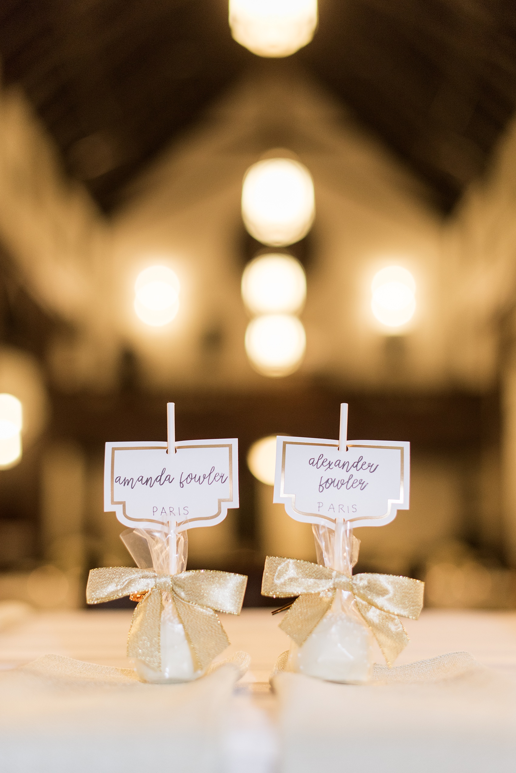 Mikkel Paige Photography captures beautiful details and fall styles during a wedding in Downtown Raleigh, North Carolina. The bride and groom decorated All Saints Chapel with gold + silver decor and autumn accents. Cake pops with custom signage decorated the indoor reception room and colorful pictures were taken outdoors. Click through for all the event details from this celebration! #MikkelPaige #RaleighWeddingPhotographer #RaleighWedding #DowntownRaleighWedding #Kilt #BlushGown