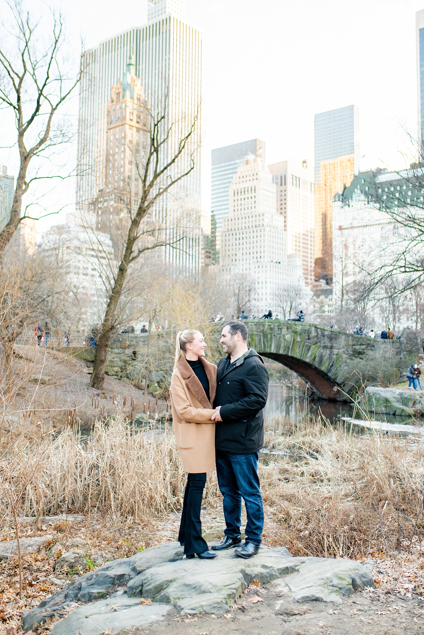 NYC proposal ideas in Central Park with photography by New York City marriage proposal photographer, Mikkel Paige Photography. Of all the cities in the world so many people dream of getting engaged in iconic, beautiful NY. Manhattan is wonderful whether winter, spring, summer, or fall and we're seasoned pros at capturing your moment. Christmas time is magic, Valentine's Day romantic and everyday between can be made memorable! Click through for more grand ideas! #MikkelPaige #NYCproposal #marryme