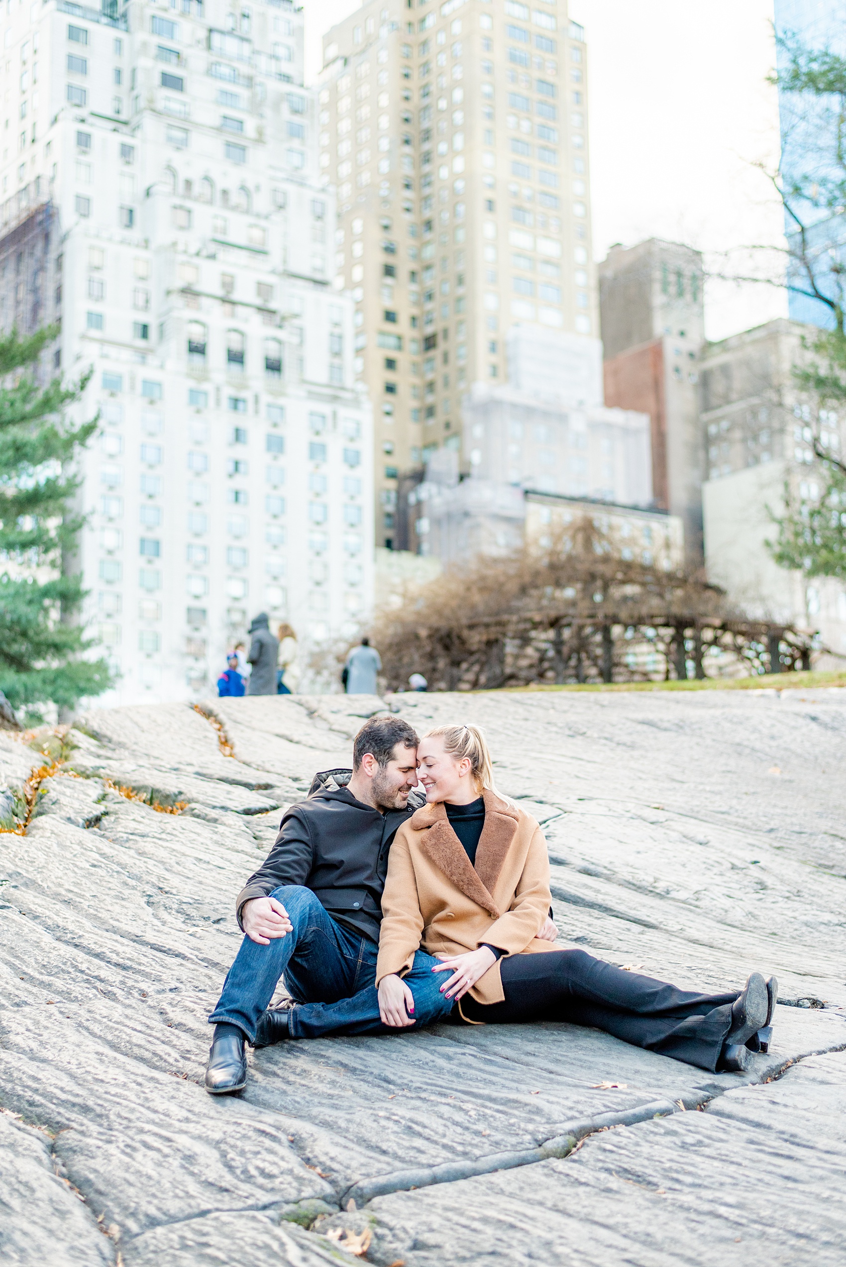 NYC proposal ideas in Central Park with photography by New York City marriage proposal photographer, Mikkel Paige Photography. Of all the cities in the world so many people dream of getting engaged in iconic, beautiful NY. Manhattan is wonderful whether winter, spring, summer, or fall and we're seasoned pros at capturing your moment. Christmas time is magic, Valentine's Day romantic and everyday between can be made memorable! Click through for more grand ideas! #MikkelPaige #NYCproposal #marryme
