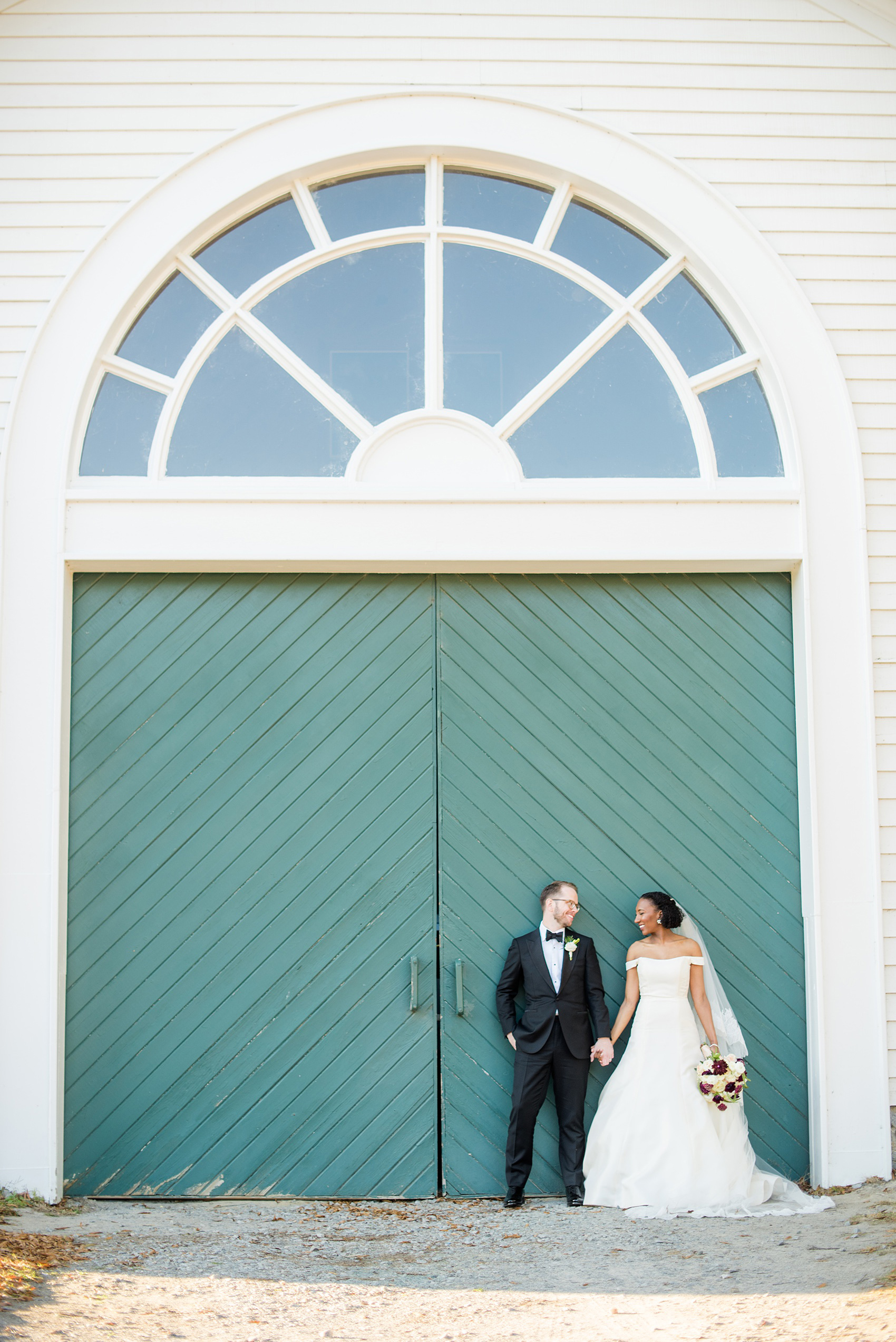 A fall wedding with burgundy, dusty rose and grey details. Mikkel Paige Photography, photographer in Greenville NC and Raleigh, captured this wedding at Rock Springs Center, planned by @vivalevent. The bride and groom had beautiful photos during golden hour on an autumn day! Click through for details! #mikkelpaige NCwedding #northcarolinawedding #southernwedding #brideandgroom