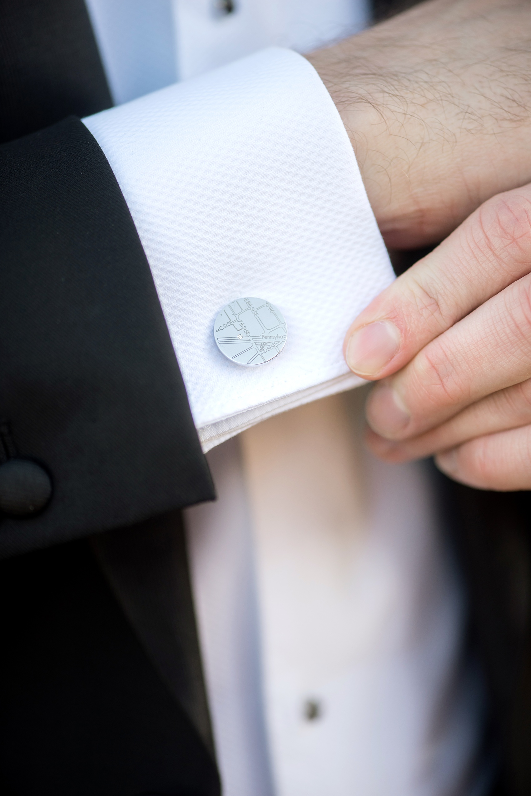 A fall wedding with burgundy, dusty rose and grey details. The groom got ready in a hotel room nearby and opened a special gift of Chicago cufflinks from his bride. Mikkel Paige Photography, photographer in Greenville NC and Raleigh captured this wedding at Rock Springs Center, planned by @vivalevent. Click through for more details and pictures from their day! #mikkelpaige #northcarolinawedding #southernwedding #gettingready #groomstyle #burgundywedding #chicagocufflinks #chicagogroom