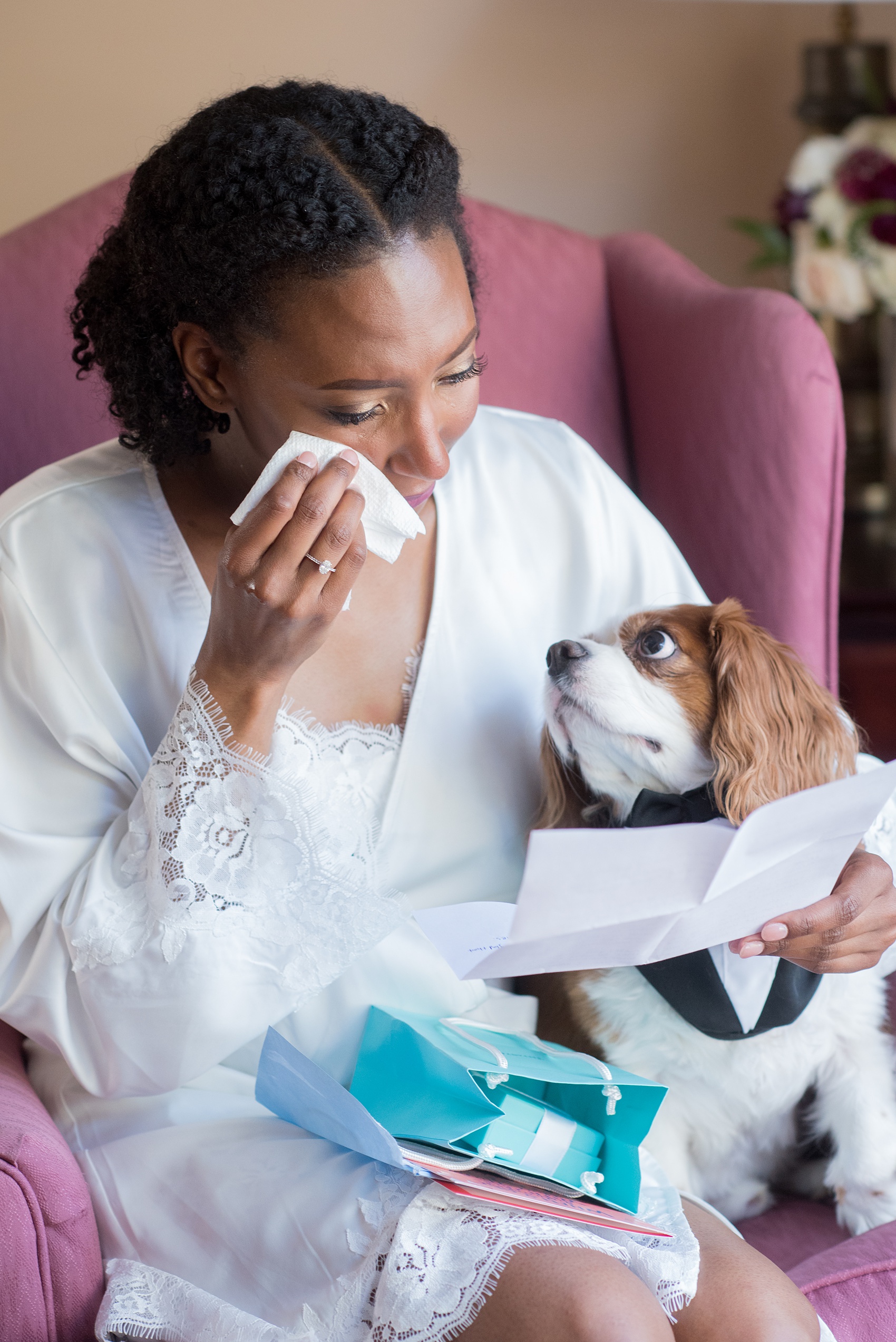 A fall wedding with burgundy, dusty rose and grey details. The bride got ready at her childhood home near the venue and opened a special Tiffany bracelet gift from her groom. Mikkel Paige Photography, photographer in Greenville NC and Raleigh captured this wedding at Rock Springs Center, planned by @vivalevent. Click through for more details and pictures from their day! #mikkelpaige #northcarolinawedding #southernwedding #gettingready #burgundywedding #bridestyle #tiffanybracelet