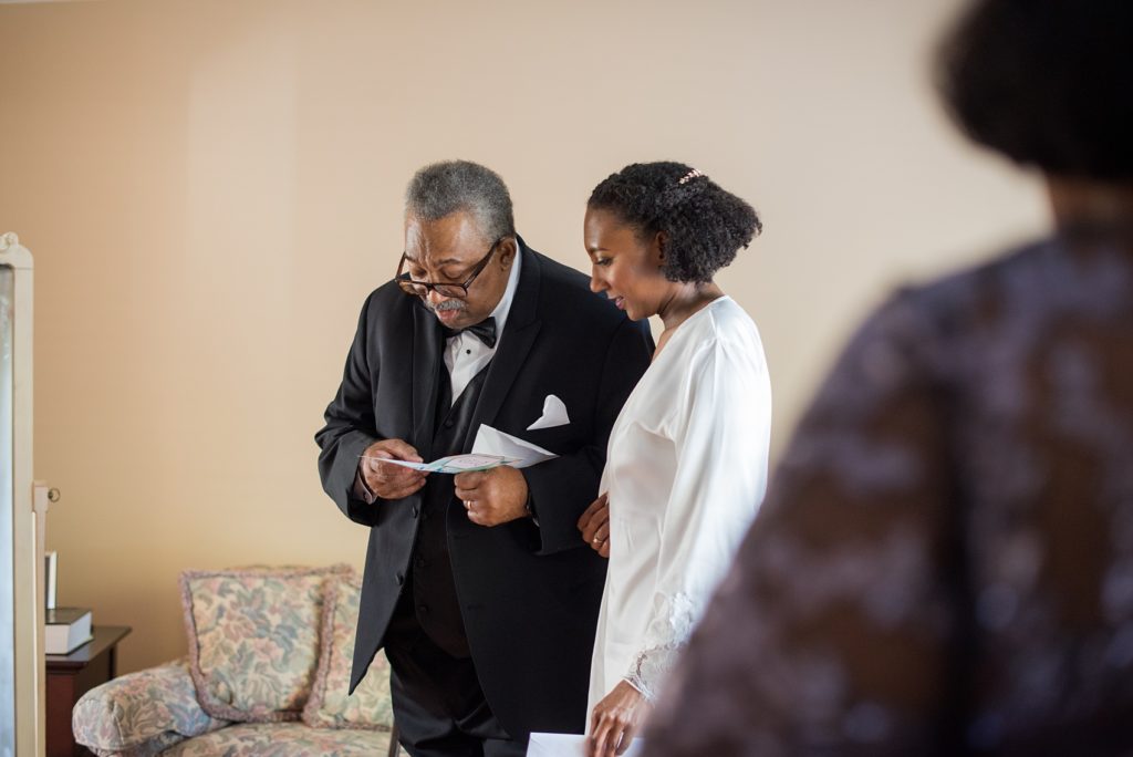 A fall wedding with burgundy, dusty rose and grey details. The bride gave her father a special letter to read just before her ceremony. Mikkel Paige Photography, photographer in Greenville NC and Raleigh captured this wedding at Rock Springs Center, planned by @vivalevent. Click through for more details and pictures from this autumn day! #mikkelpaige #northcarolinawedding #southernwedding #burgundywedding #fatherofthebride
