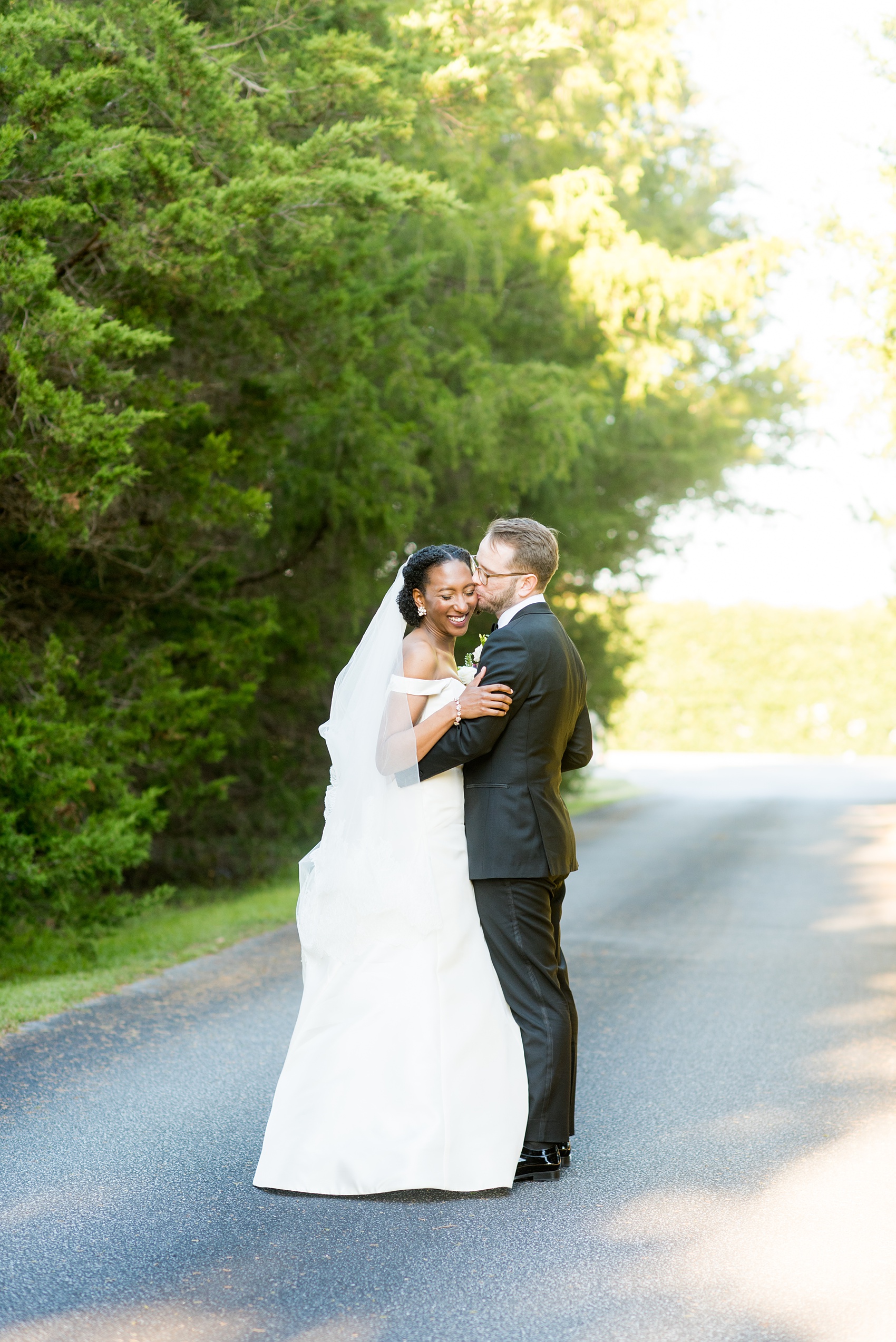 A fall wedding with burgundy, dusty rose and grey details. Mikkel Paige Photography, photographer in Greenville NC and Raleigh, captured this wedding at Rock Springs Center, planned by @vivalevent. The bride and groom had beautiful photos during golden hour on an autumn day! Click through for details! #mikkelpaige NCwedding #northcarolinawedding #southernwedding #brideandgroom