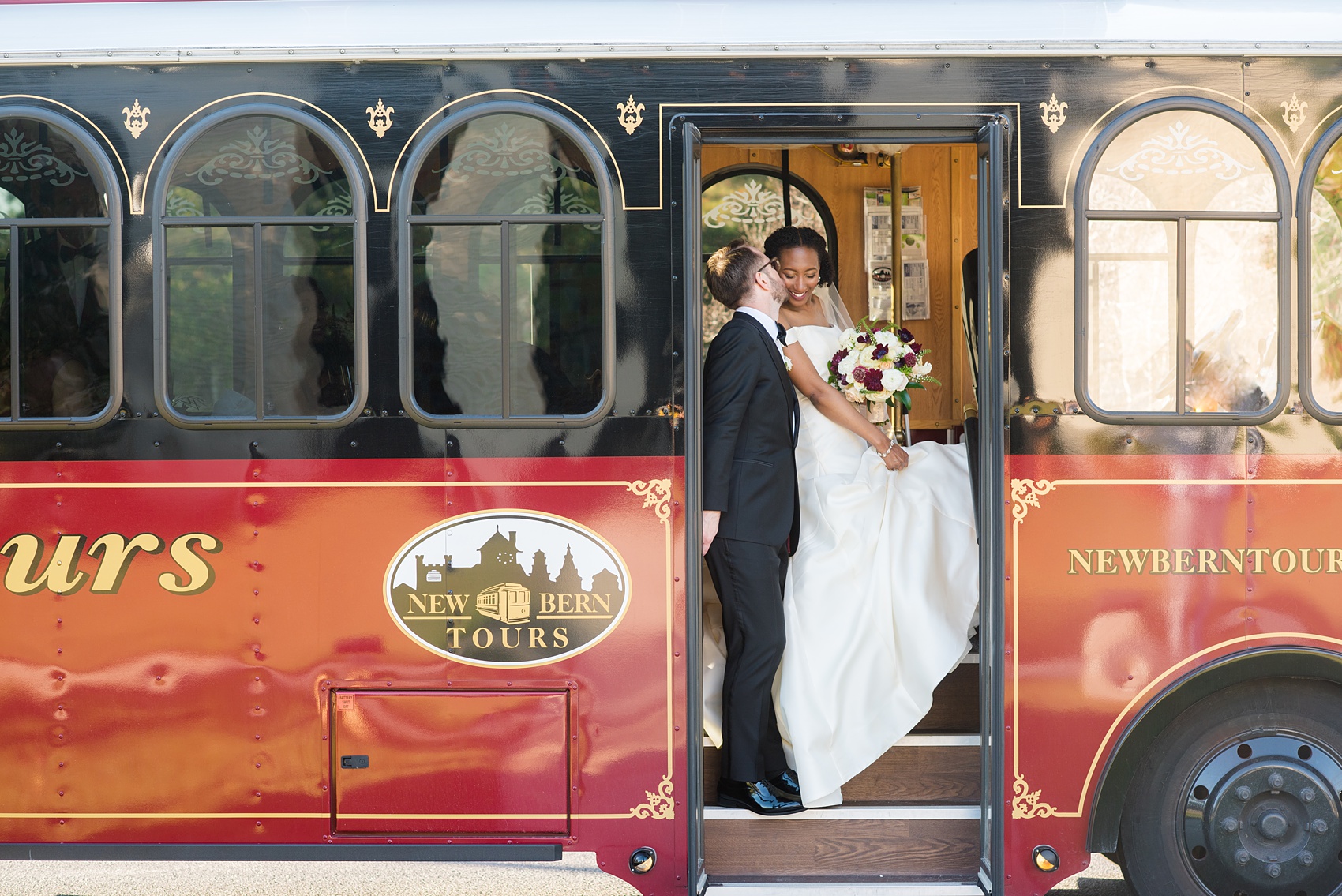 A fall wedding with burgundy, dusty rose and grey details. Mikkel Paige Photography, photographer in Greenville NC and Raleigh, captured this wedding at Rock Springs Center, planned by @vivalevent. The bride and groom had beautiful photos during golden hour on an autumn day! Click through for details! #mikkelpaige NCwedding #northcarolinawedding #southernwedding #brideandgroom #trolleyphotos