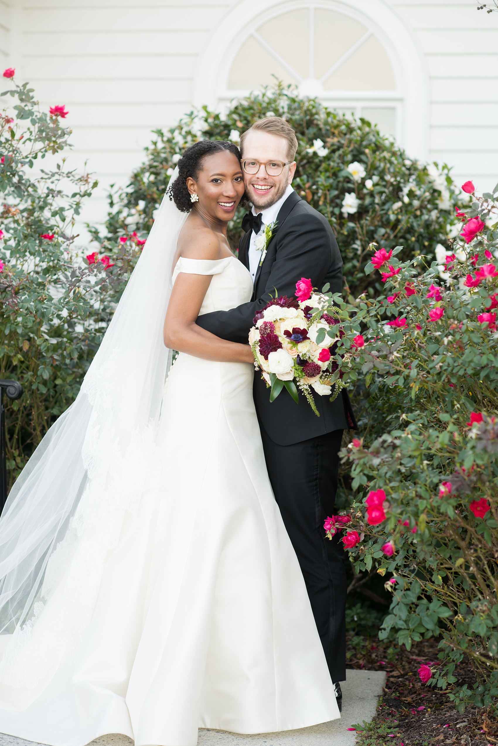 A fall wedding with burgundy, dusty rose and grey details. Mikkel Paige Photography, photographer in Greenville NC and Raleigh, captured this wedding at Rock Springs Center, planned by @vivalevent. The bride and groom had beautiful photos during golden hour on an autumn day! Click through for details! #mikkelpaige NCwedding #northcarolinawedding #southernwedding #brideandgroom