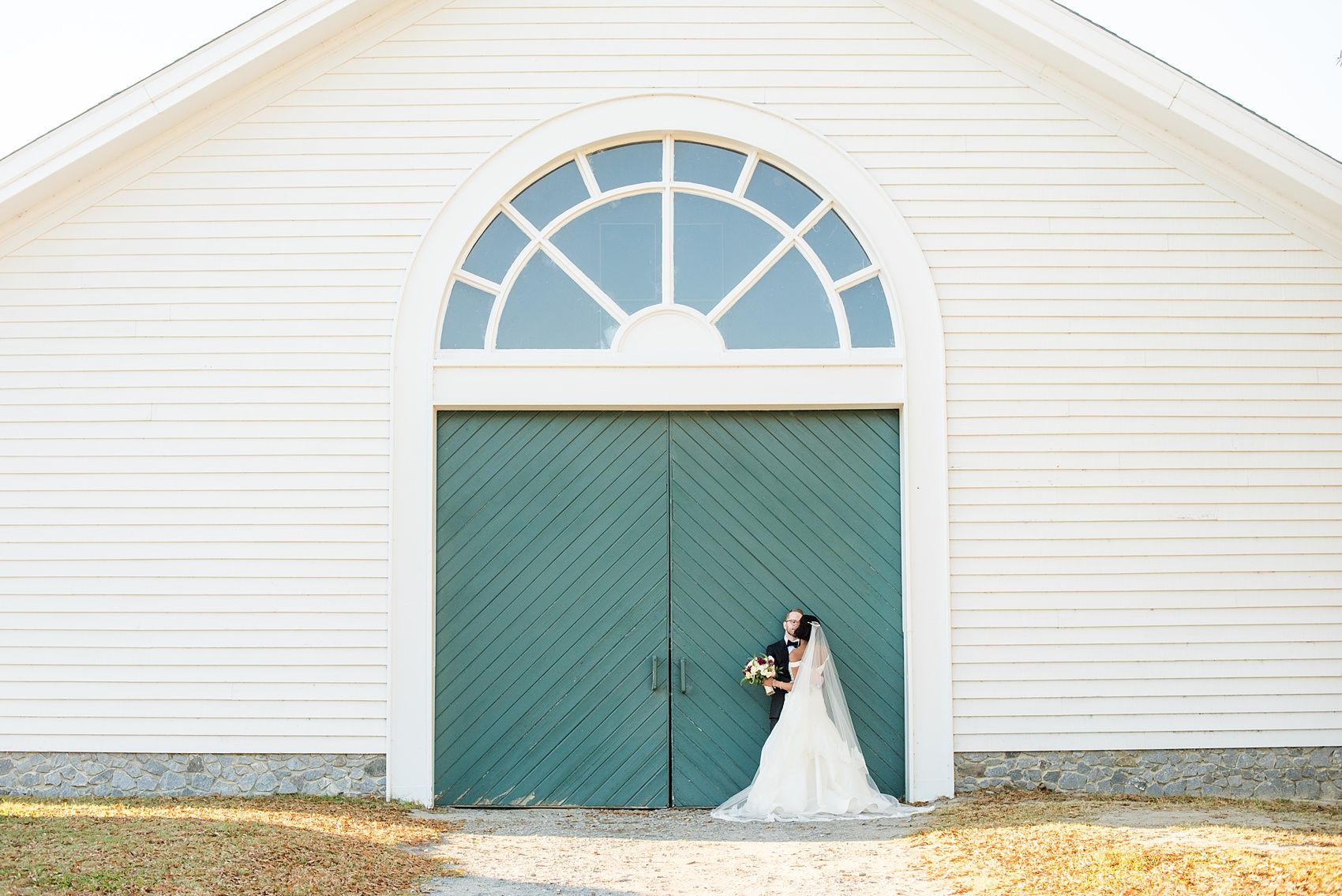 A fall wedding with burgundy, dusty rose and grey details. Mikkel Paige Photography, photographer in Greenville NC and Raleigh, captured this wedding at Rock Springs Center, planned by @vivalevent. The bride and groom had beautiful photos during golden hour on an autumn day! Click through for details! #mikkelpaige NCwedding #northcarolinawedding #southernwedding #brideandgroom