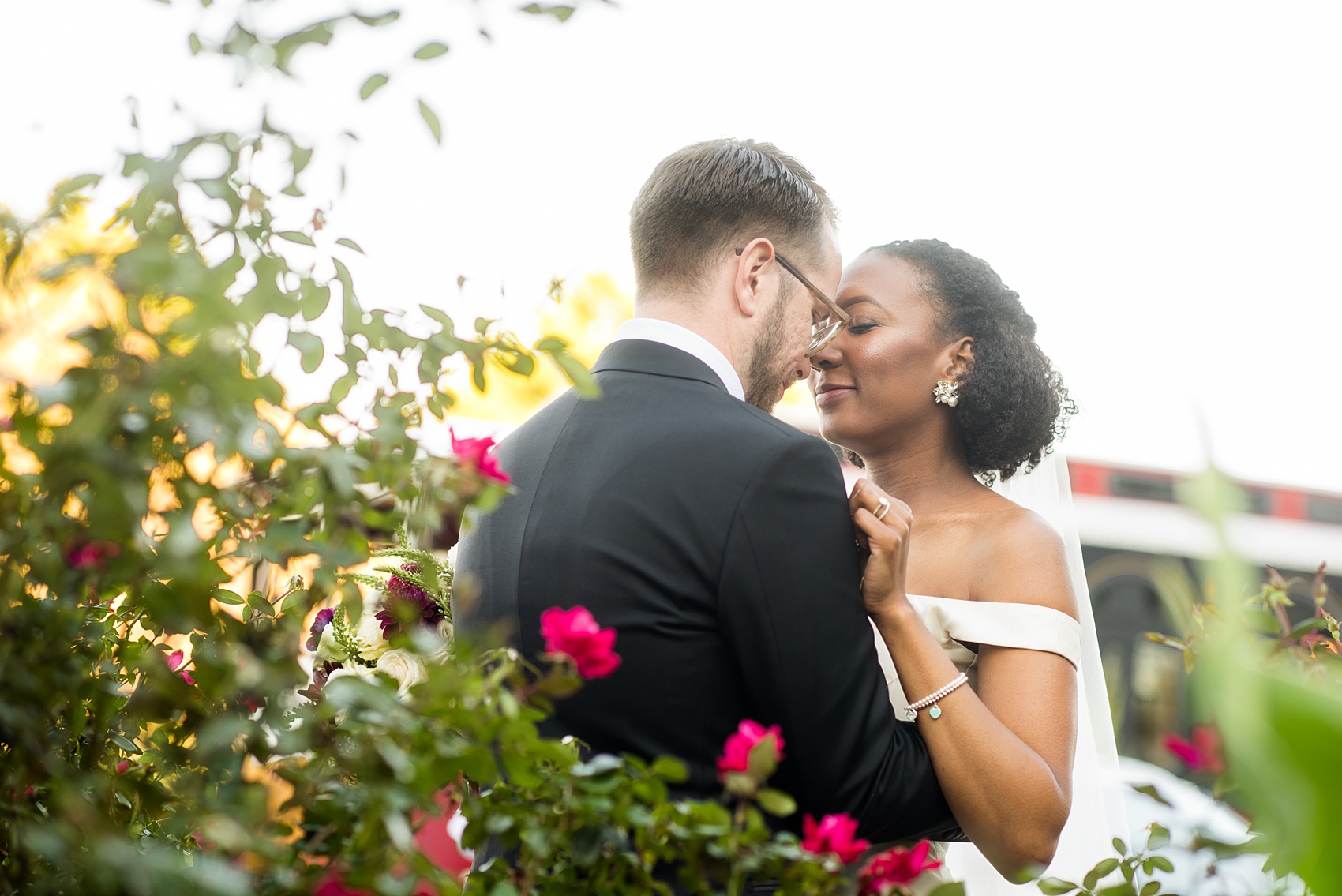 A fall wedding with burgundy, dusty rose and grey details. Mikkel Paige Photography, photographer in Greenville NC and Raleigh, captured this wedding at Rock Springs Center, planned by @vivalevent. The bride and groom had beautiful photos during golden hour on an autumn day! Click through for details! #mikkelpaige NCwedding #northcarolinawedding #southernwedding #brideandgroom