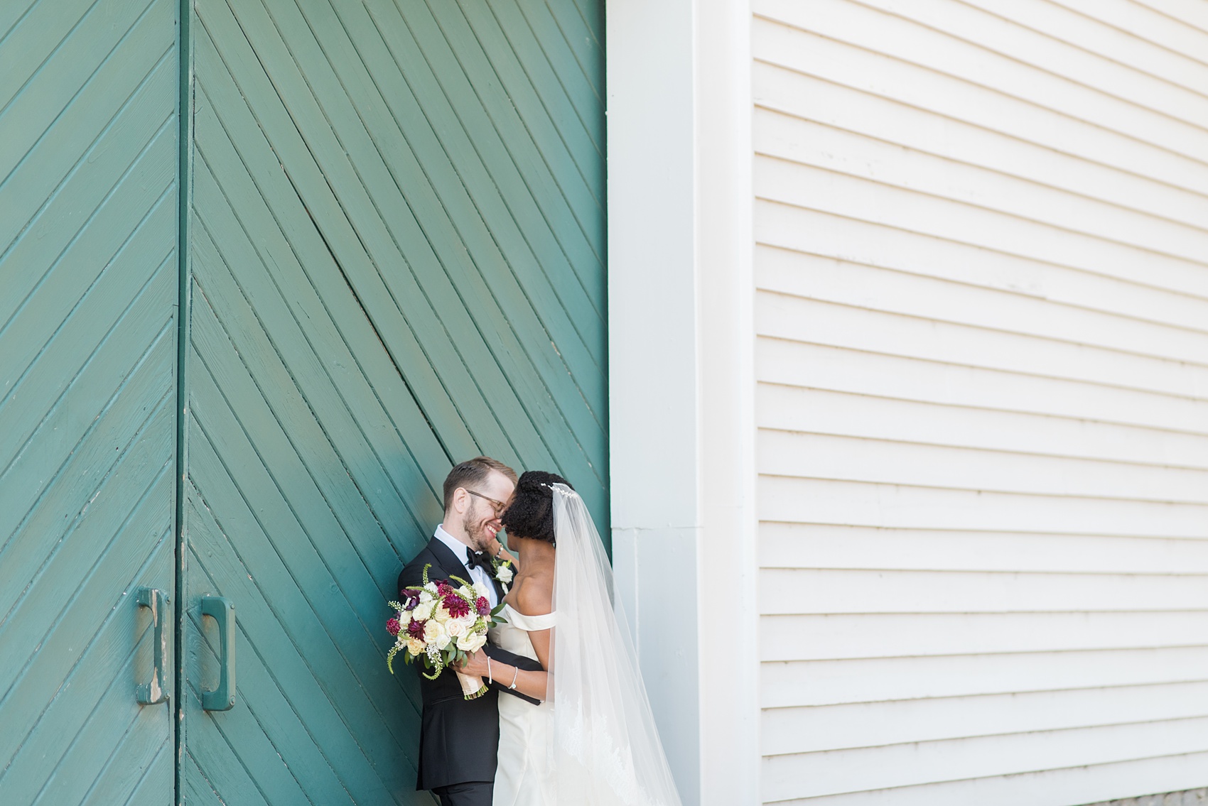 A fall wedding with burgundy, dusty rose and grey details. Mikkel Paige Photography, photographer in Greenville NC and Raleigh, captured this wedding at Rock Springs Center, planned by @vivalevent. The bride and groom had beautiful photos during golden hour on an autumn day! Click through for details! #mikkelpaige NCwedding #northcarolinawedding #southernwedding #brideandgroom