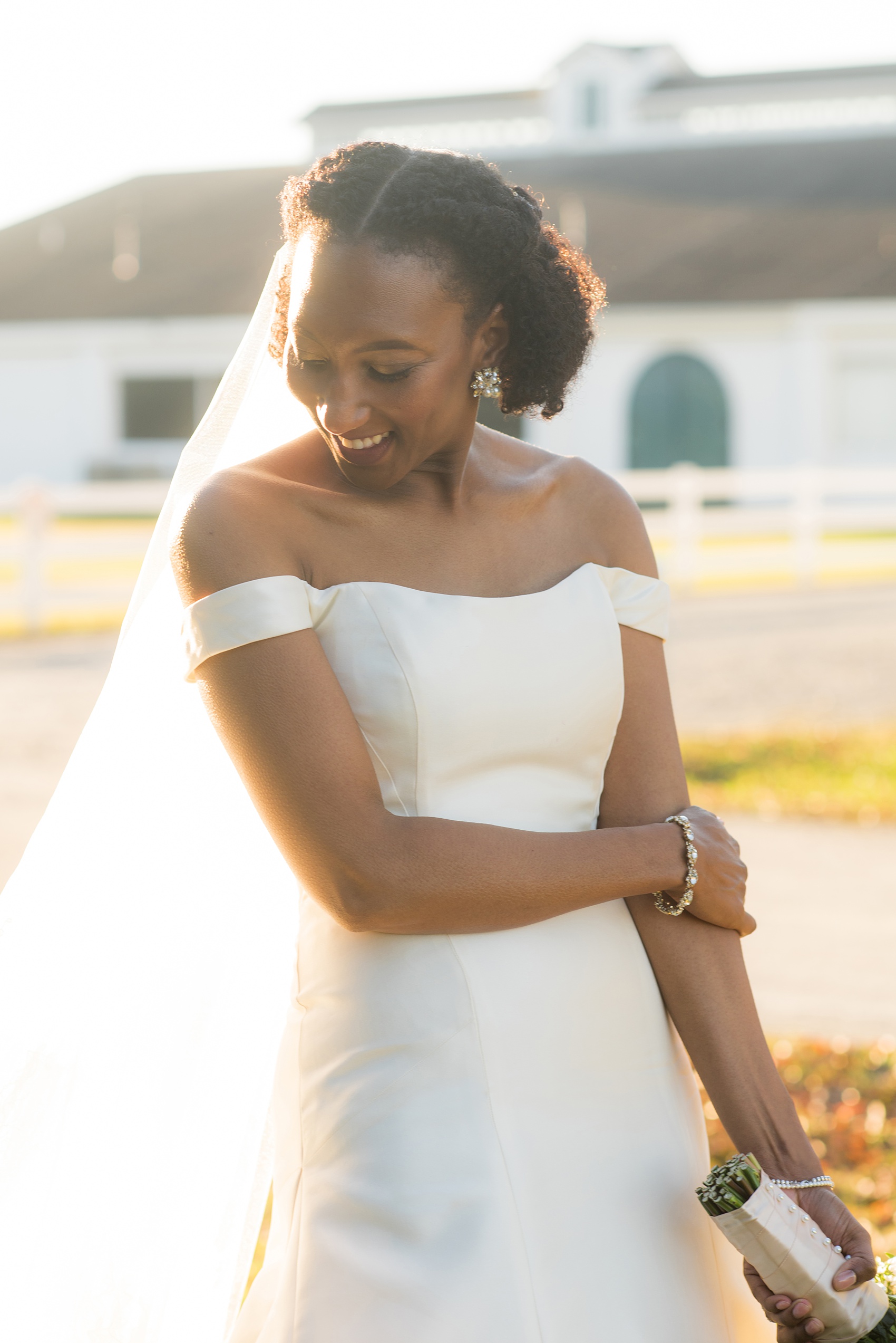 A fall wedding with burgundy, dusty rose and grey details. The bride wore an off-the-shoulder Anne Barge dress with a long veil that extended past her train. Mikkel Paige Photography, photographer in Greenville NC and Raleigh captured this wedding at Rock Springs Center, planned by @vivalevent. Click through for more details and pictures from this autumn day! #mikkelpaige #northcarolinawedding #southernwedding #burgundywedding #offtheshouldergown #annebarge #offtheshoulder #bridestyle