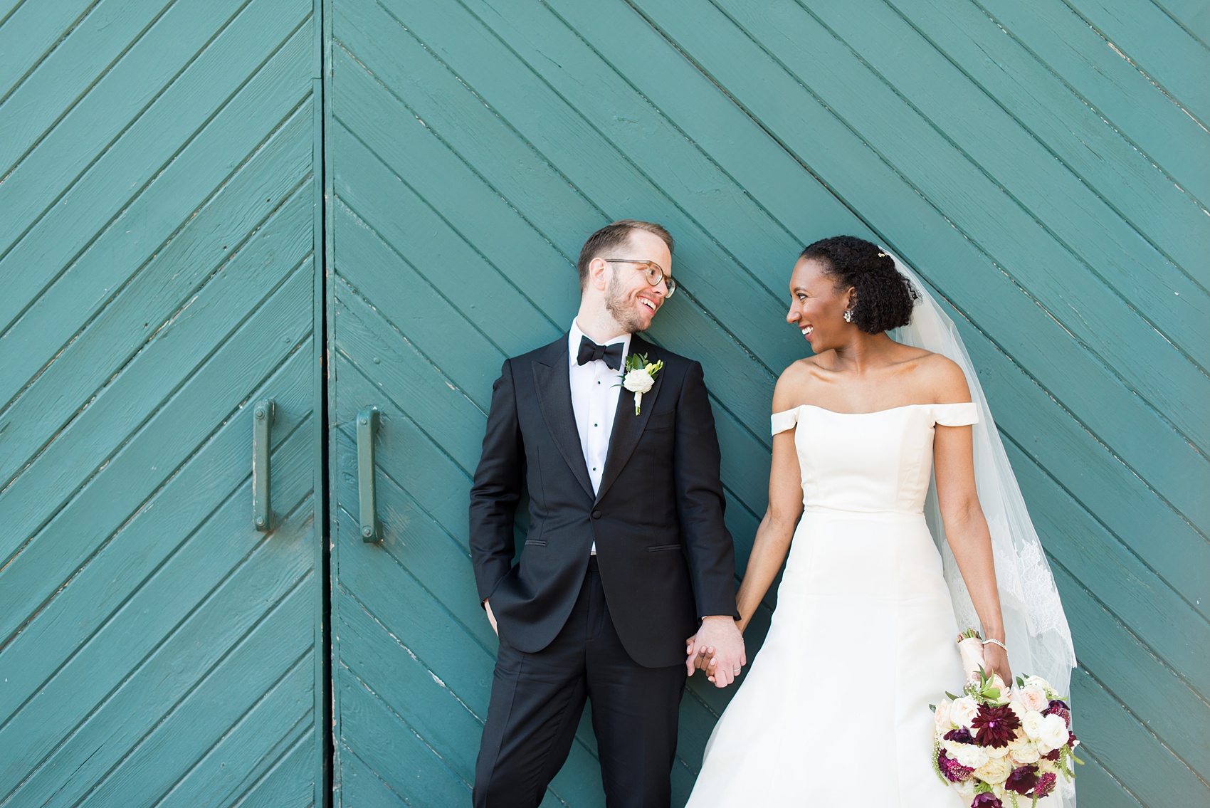 A fall wedding with burgundy, dusty rose and grey details. Mikkel Paige Photography, photographer in Greenville NC and Raleigh, captured this wedding at Rock Springs Center, planned by @vivalevent. The bride and groom had beautiful photos during golden hour on an autumn day! Click through for details! #mikkelpaige NCwedding #northcarolinawedding #southernwedding #brideandgroom