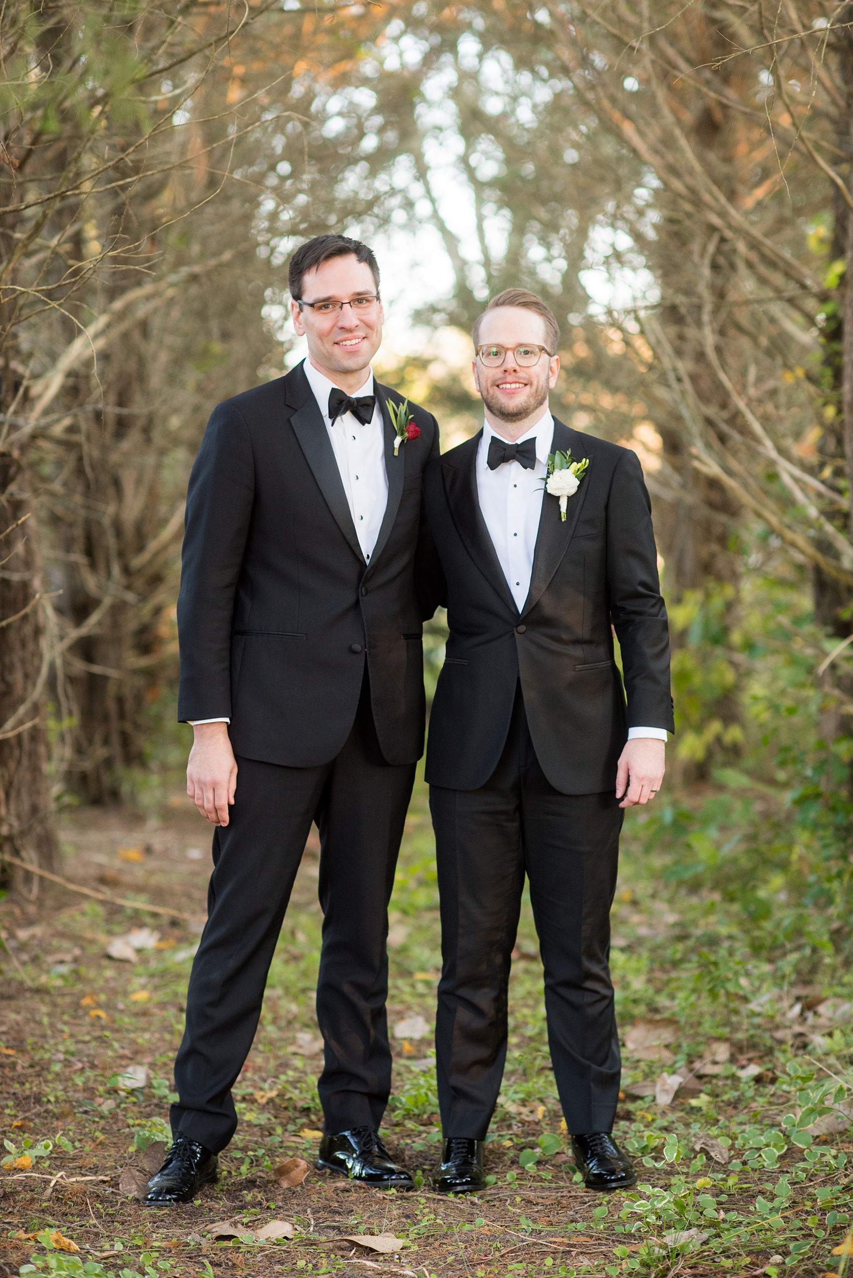 A fall wedding with burgundy, dusty rose and grey details. The bride and groom had three bridesmaids and groomsmen each, with the bridesmaids in cinnamon colored gowns and groomsmen in tuxedos. Mikkel Paige Photography, photographer in Greenville NC and Raleigh captured this wedding at Rock Springs Center, planned by @vivalevent. Click through for more details and pictures from this autumn celebration! #mikkelpaige #northcarolinawedding #southernwedding #bridesmaids#weddingparty #bridalparty