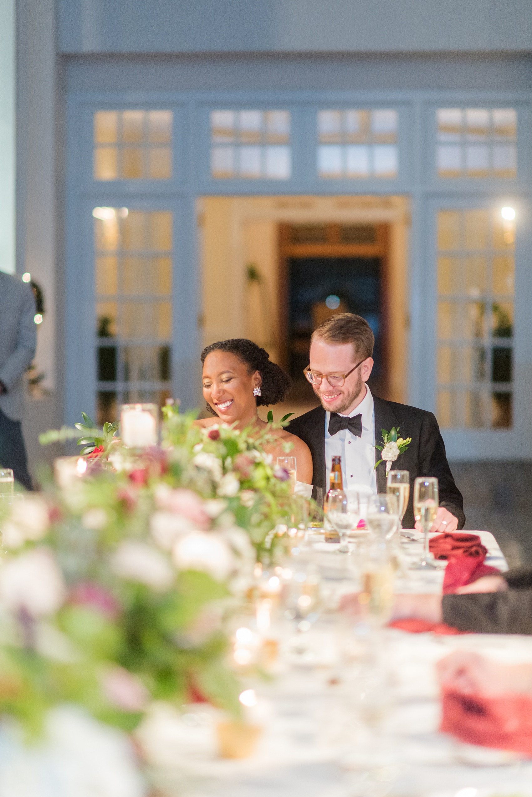 A fall wedding with burgundy, dusty rose and grey details. The guests partied on a black dance floor with a live band throughout the autumn celebration! Mikkel Paige Photography, photographer in Greenville NC and Raleigh, captured this wedding at Rock Springs Center, planned by @vivalevent. Click through for more details and pictures from their day! #mikkelpaige NCwedding #northcarolinawedding #southernwedding #weddingreception #burgundywedding